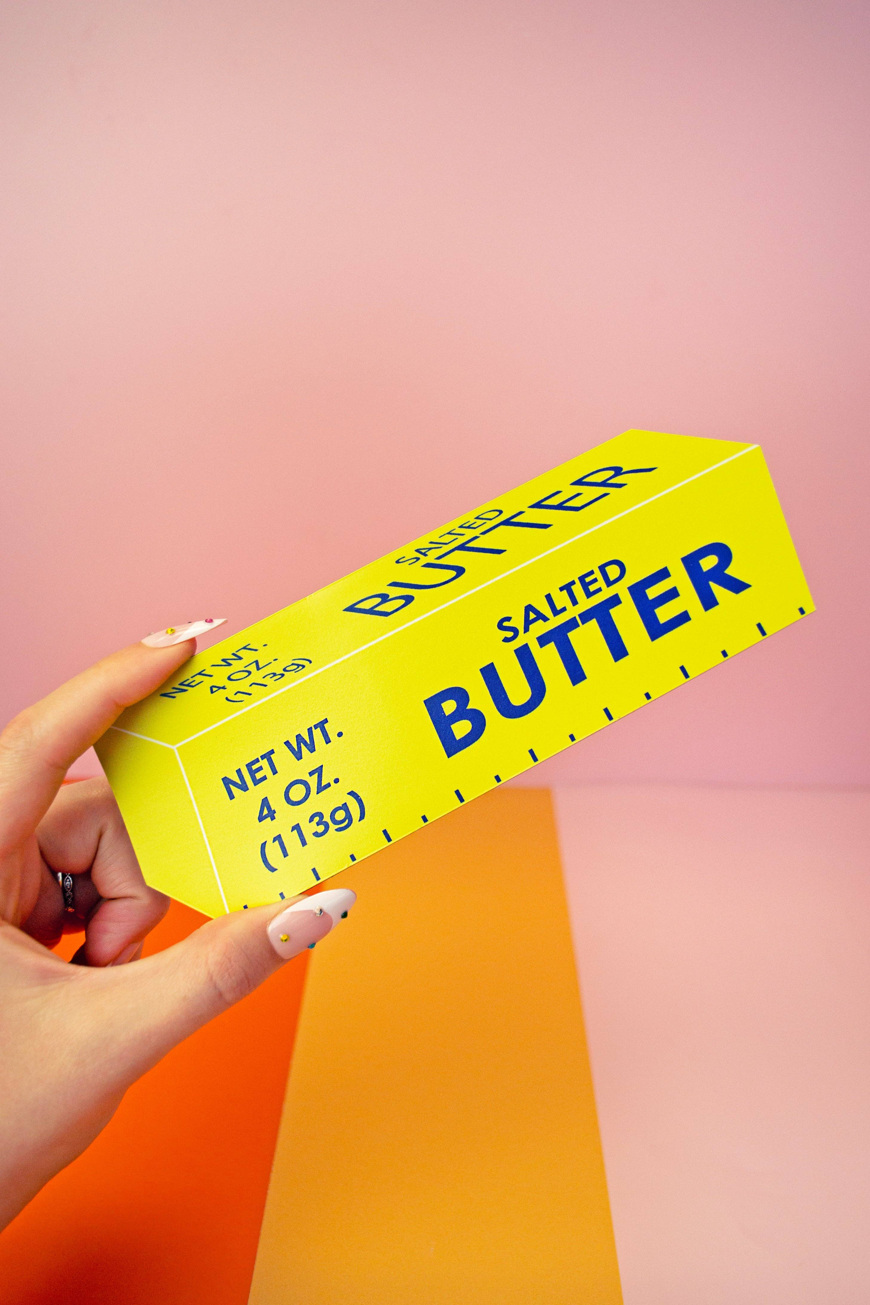 Butter Car Magnet with colours and held by hand