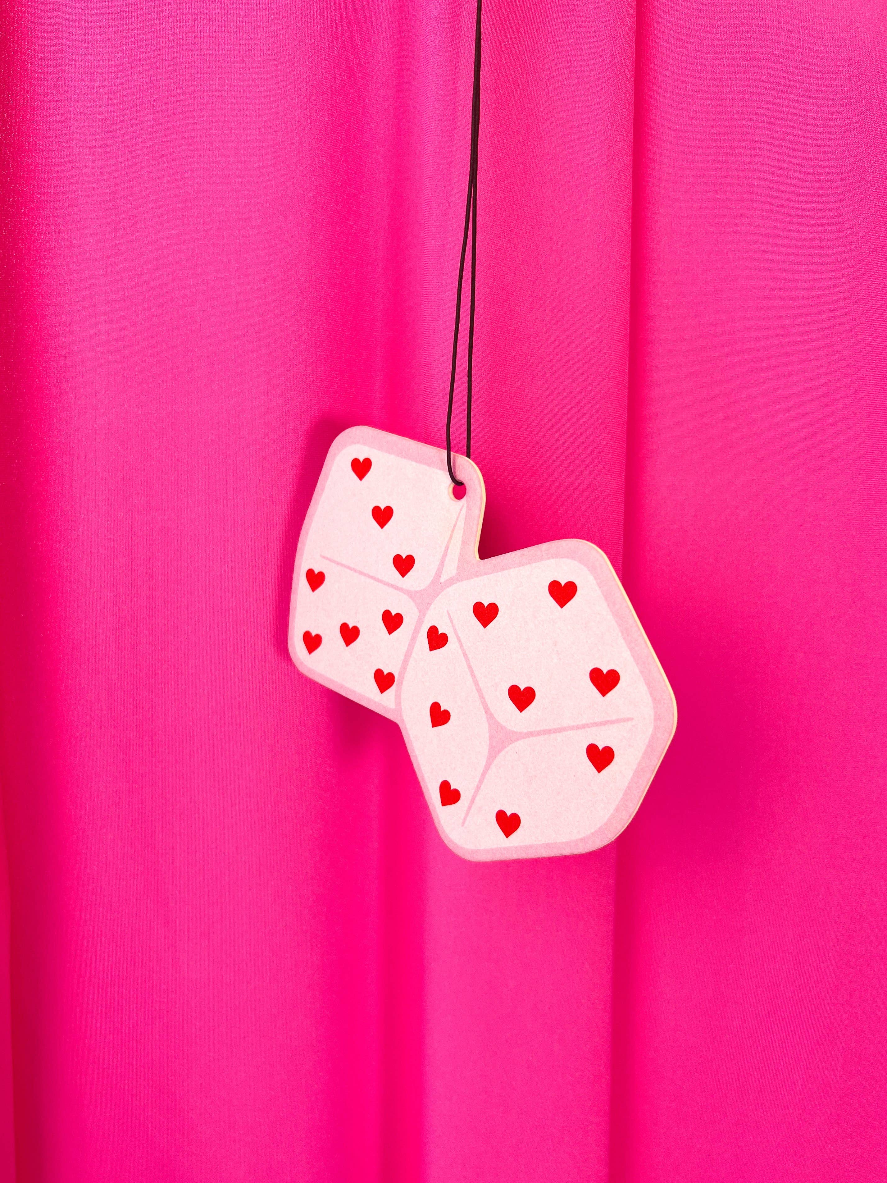Heart Dice Air Freshener with pink background
