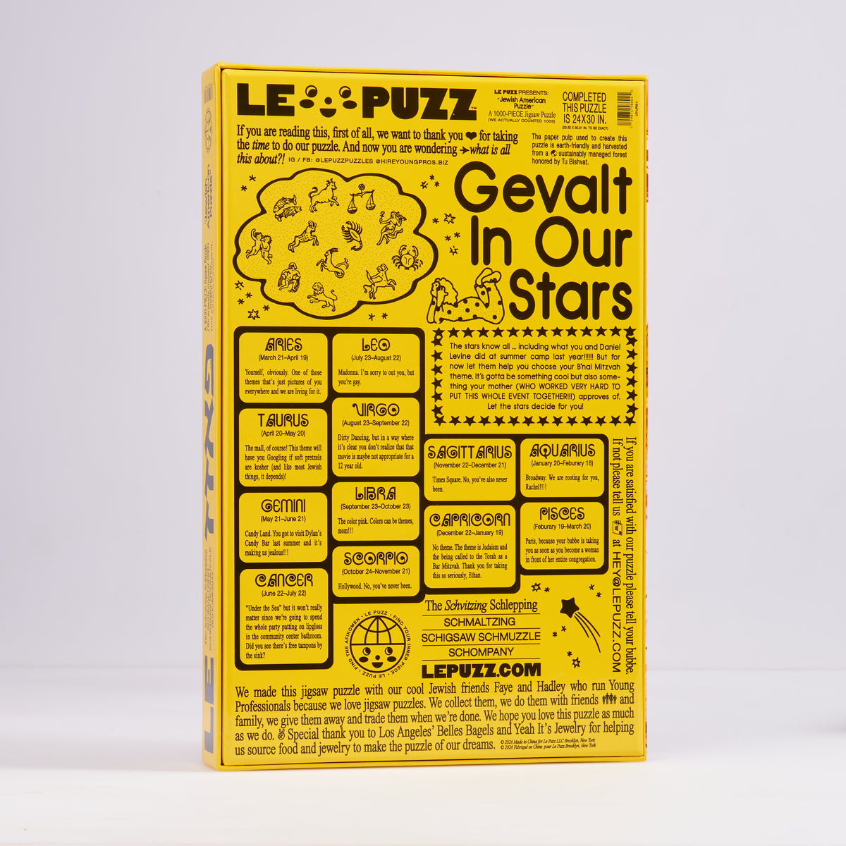 Back of the yellow Jewish American Puzzle box featuring “Gevalt In Our Stars” and illustrated zodiac signs.