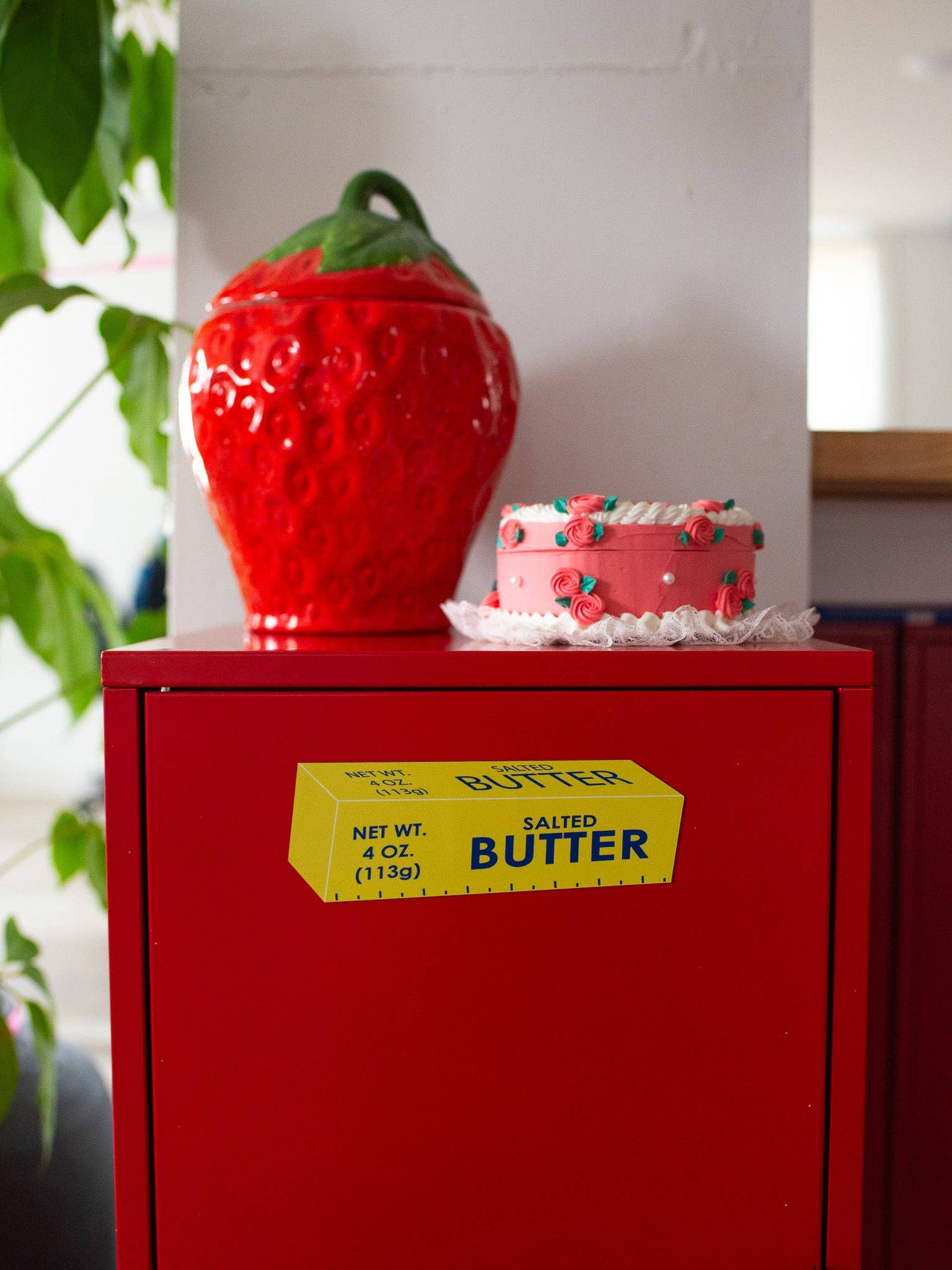 Butter Car Magnet stuck to a red locker magnetic
