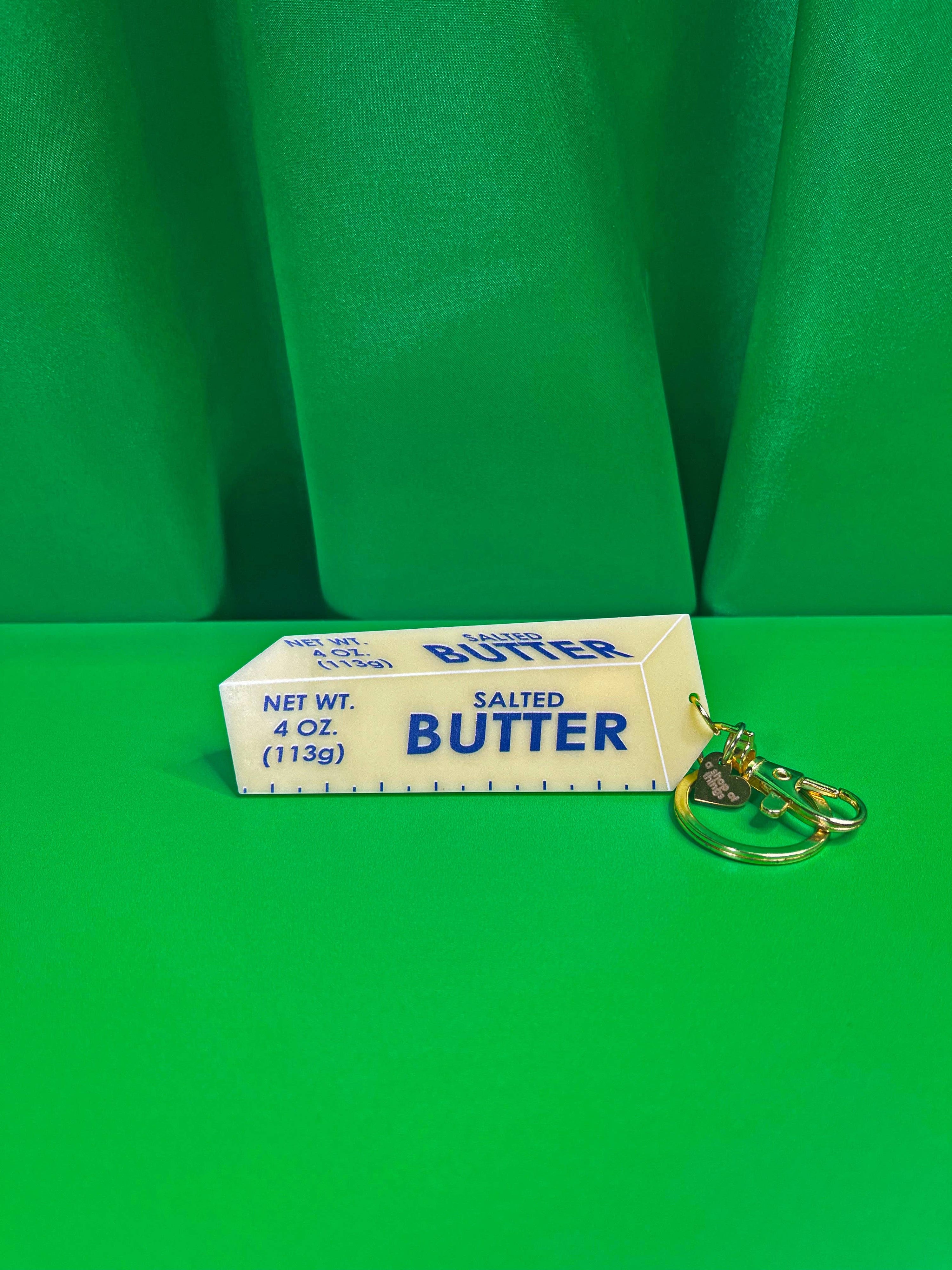 Butter Keychain with green background