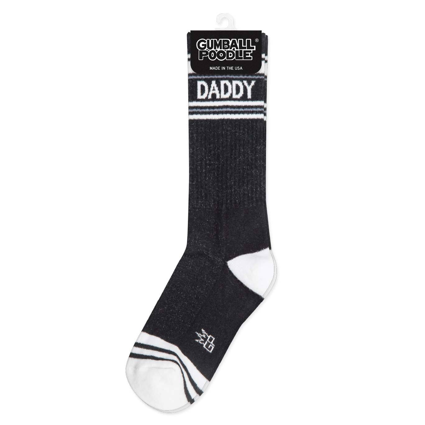 Black sock with white accents and 'Daddy' text, brand 'Gumball Poodle' visible.