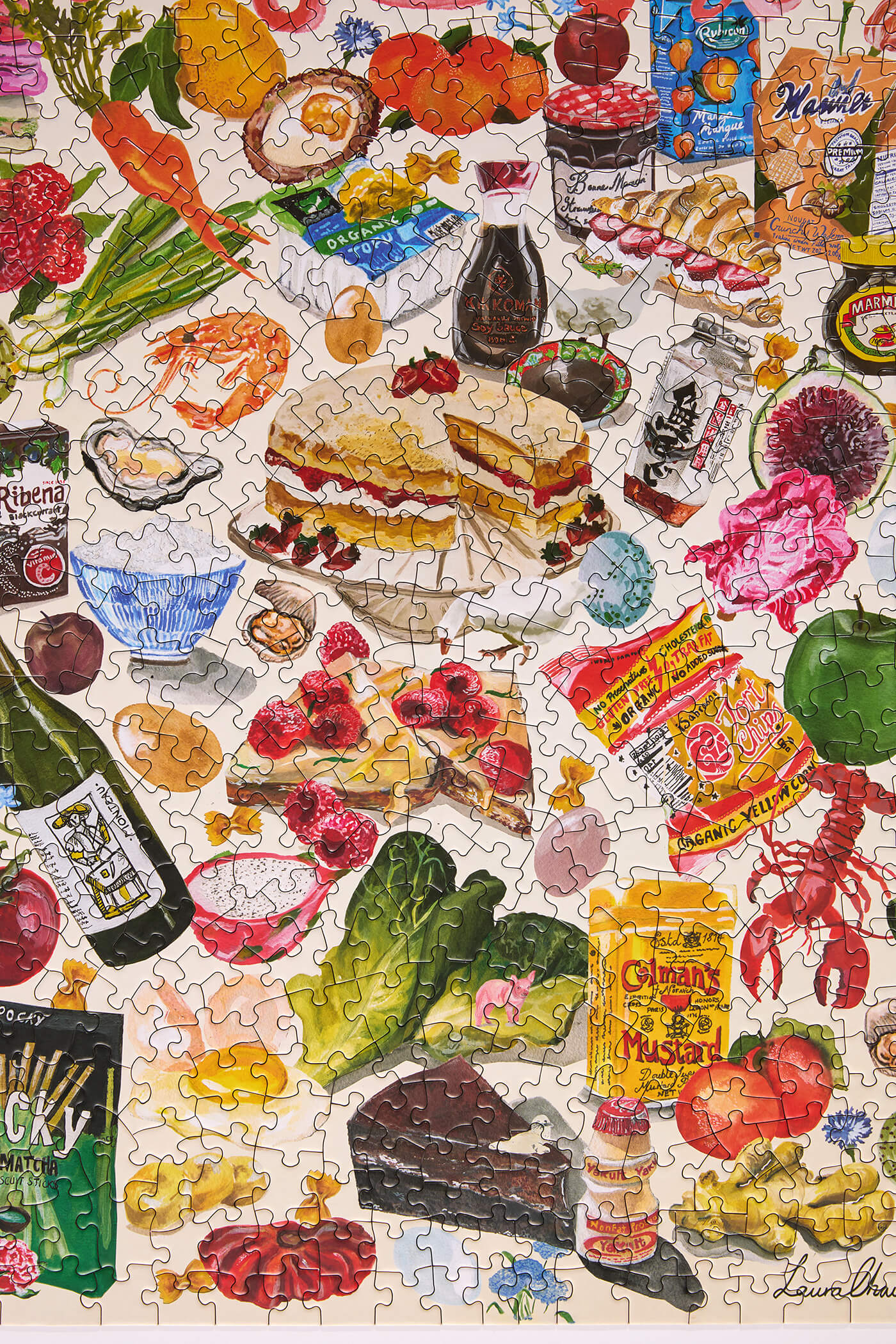 Jigsaw puzzle with food-themed pieces on a white background
