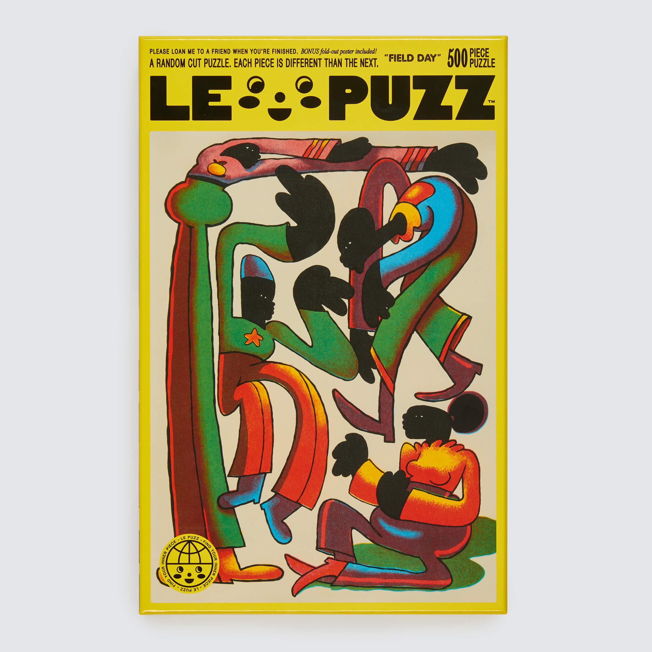 LE PUZZ puzzle box with colorful abstract design on a beige background