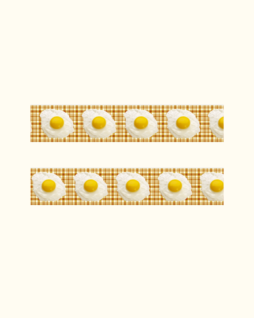 Two rows of fried eggs on a checkered background