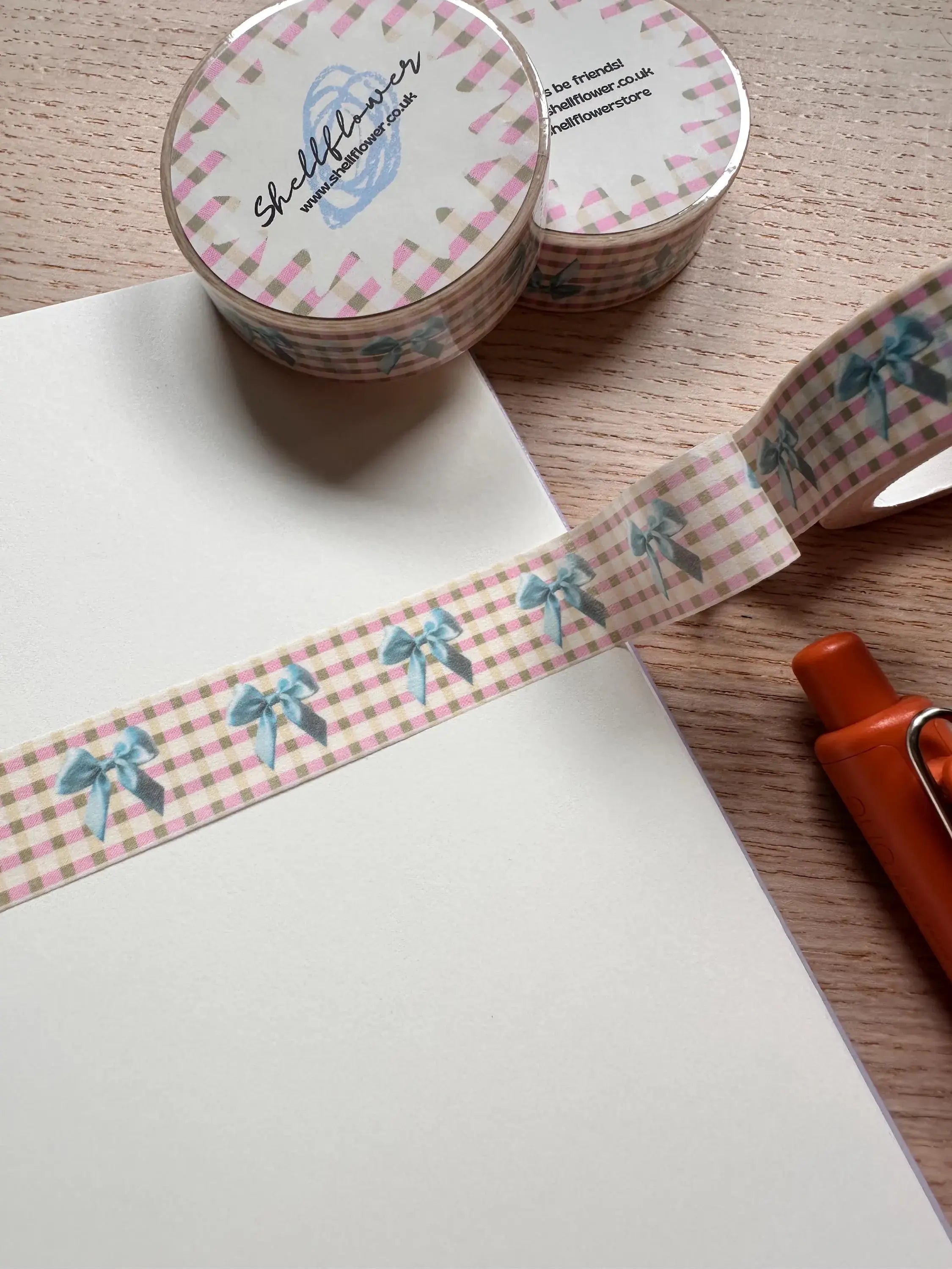 Washi tape with decorative design on a wooden surface