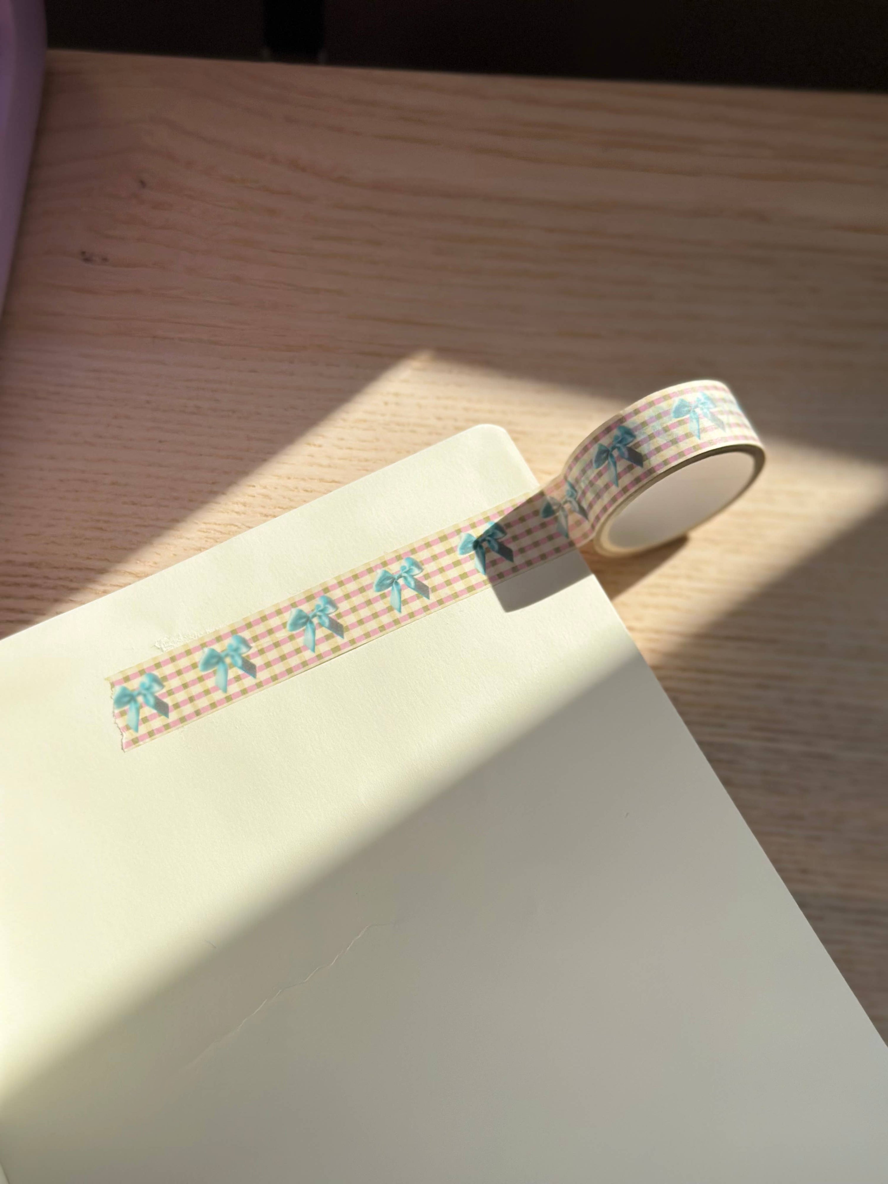 Decorative tape with cartoon designs on a notebook