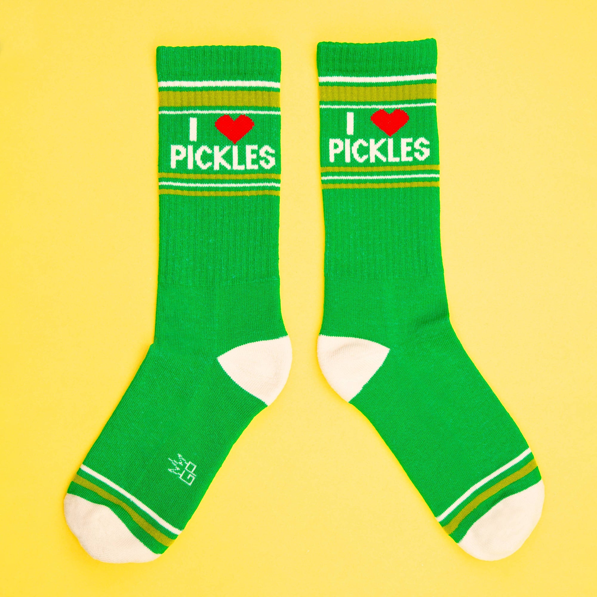 Green socks with 'I ❤️ Pickles' text on a yellow background
