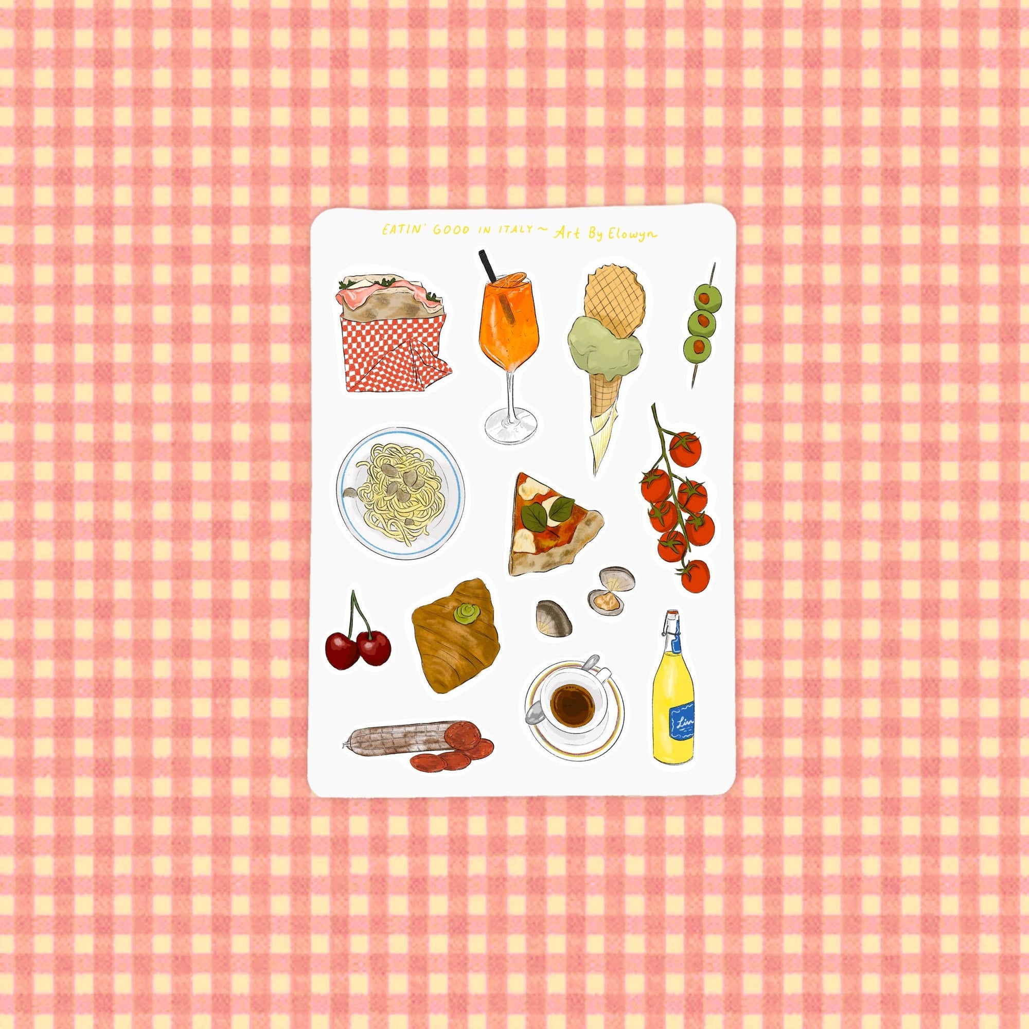 Set of food-themed stickers on a pink and white checkered background