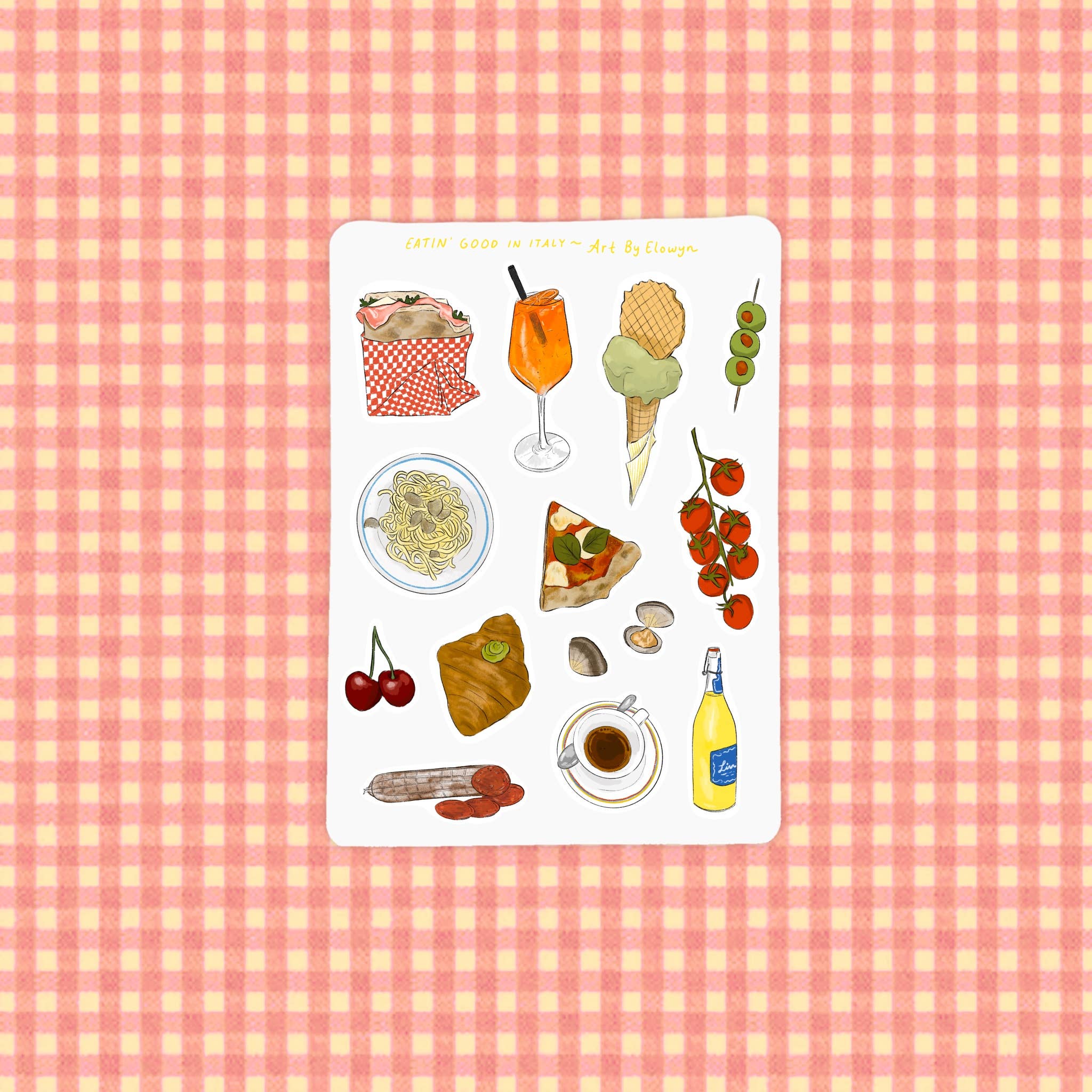 Set of food-themed stickers on a pink and white checkered background