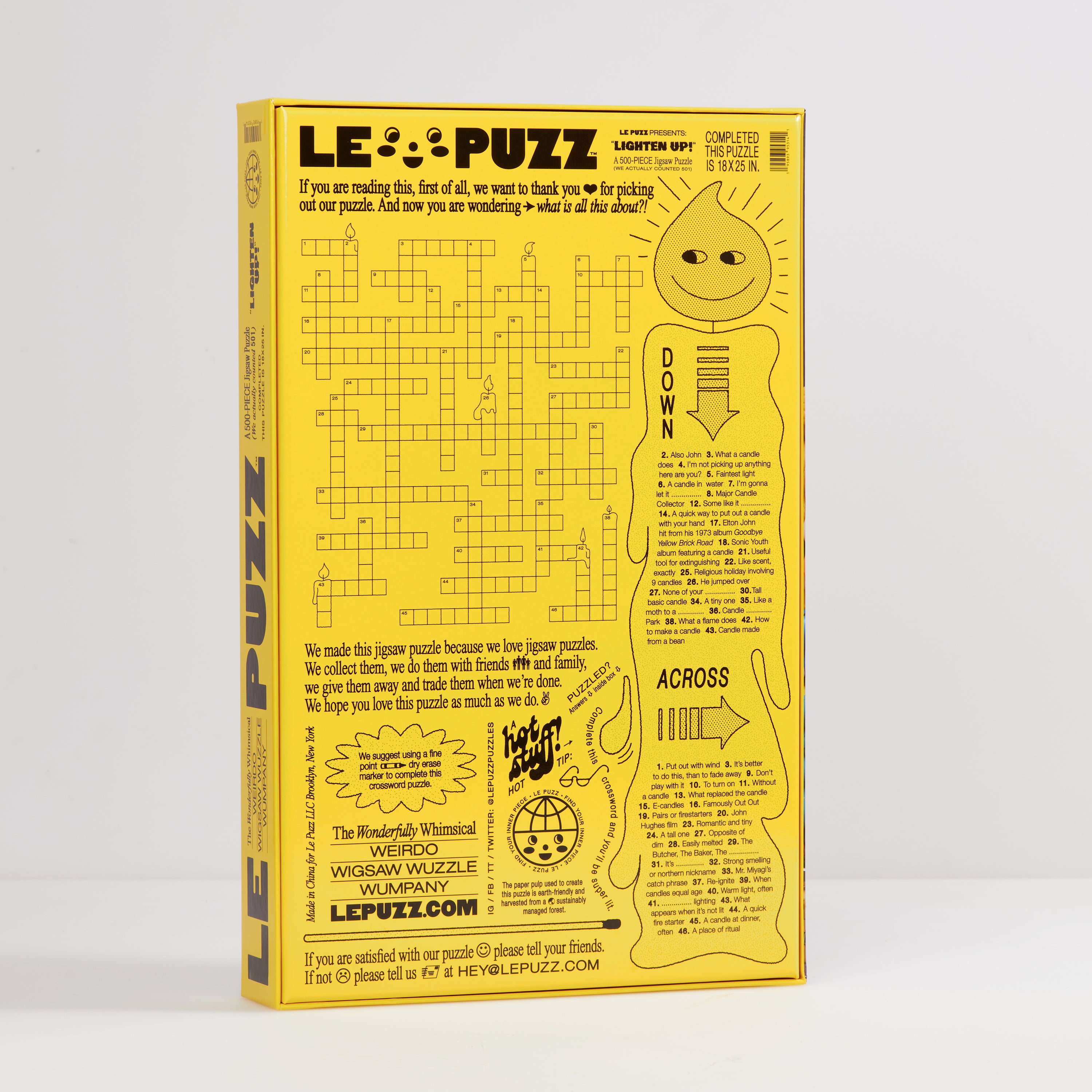 Yellow puzzle box with a crossword-style design on a white background
