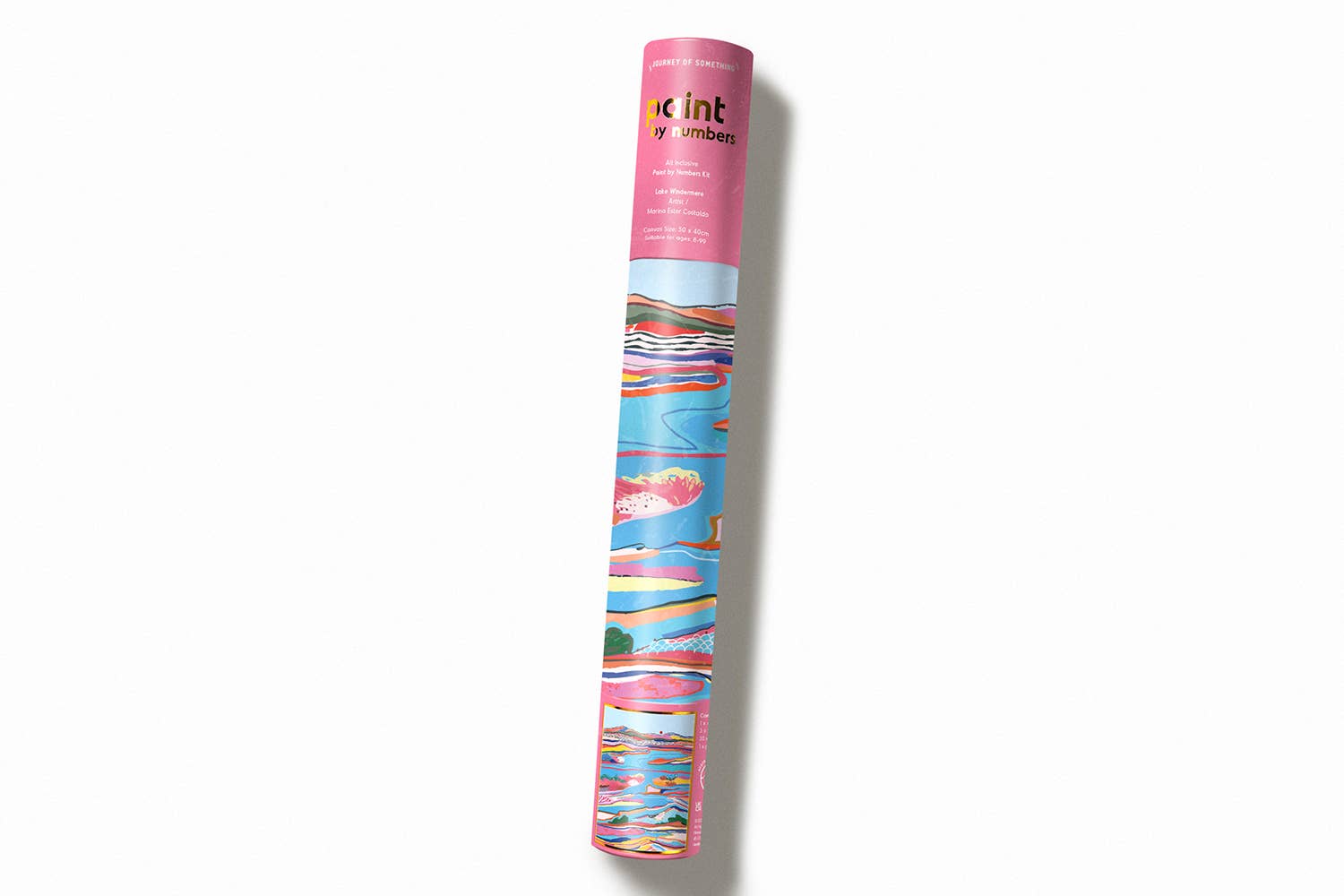 Colorful yoga mat with a pink brand label on a white background