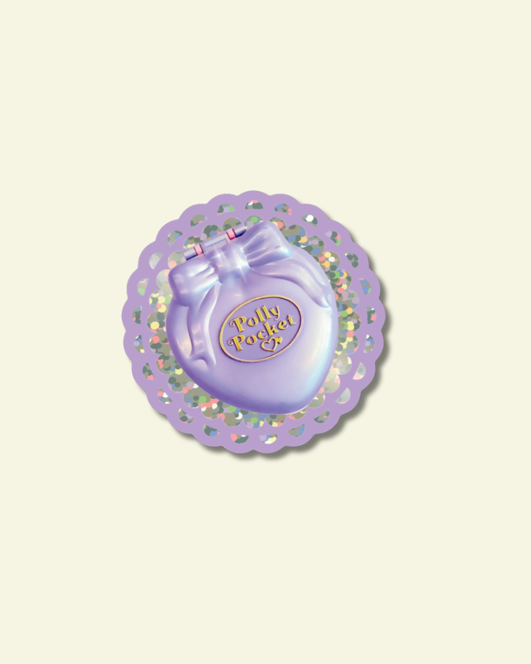 Purple Polly Pocket toy on a decorative purple and gold circular base with a light beige background