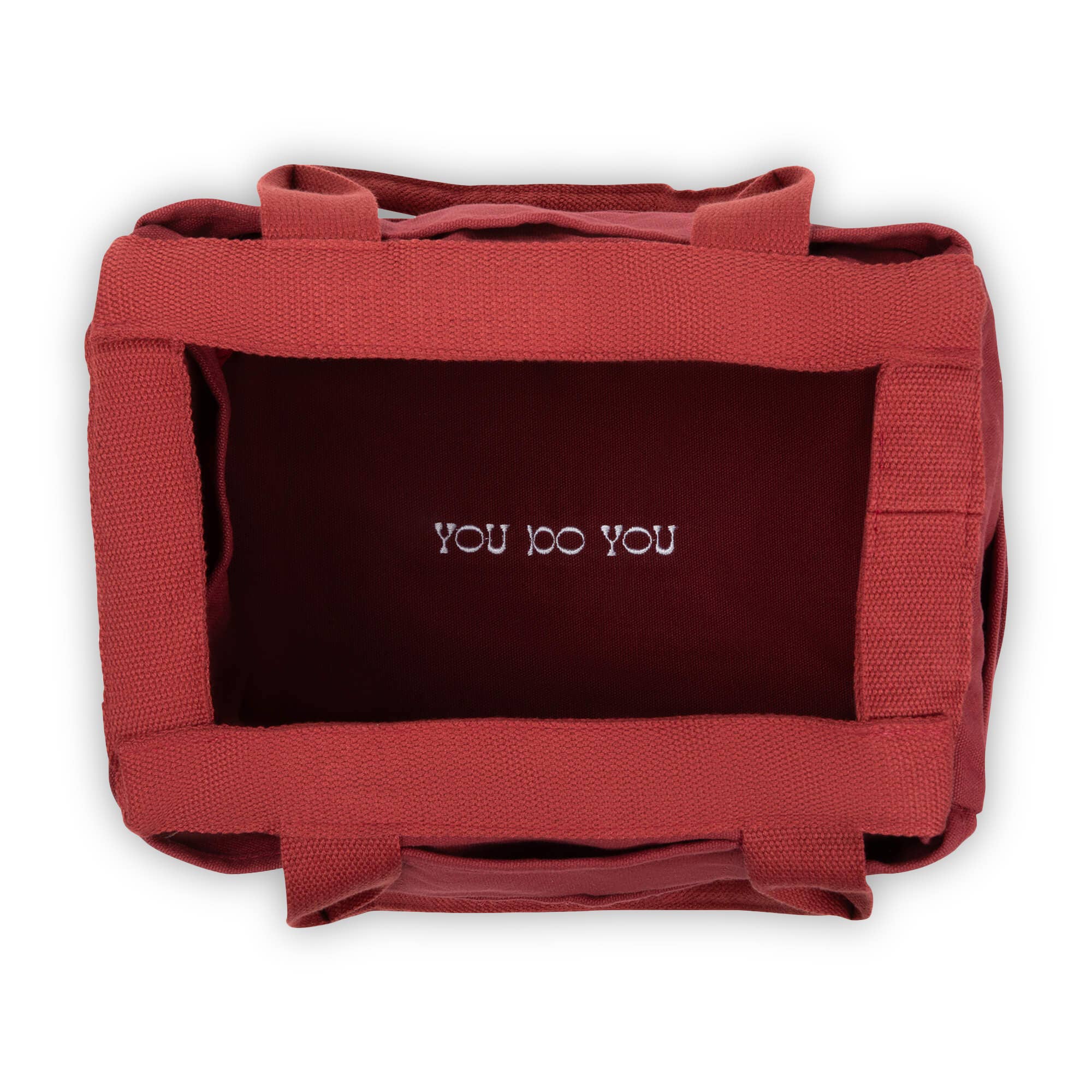 Red pet carrier with 'YOU DO YOU' text on a white background