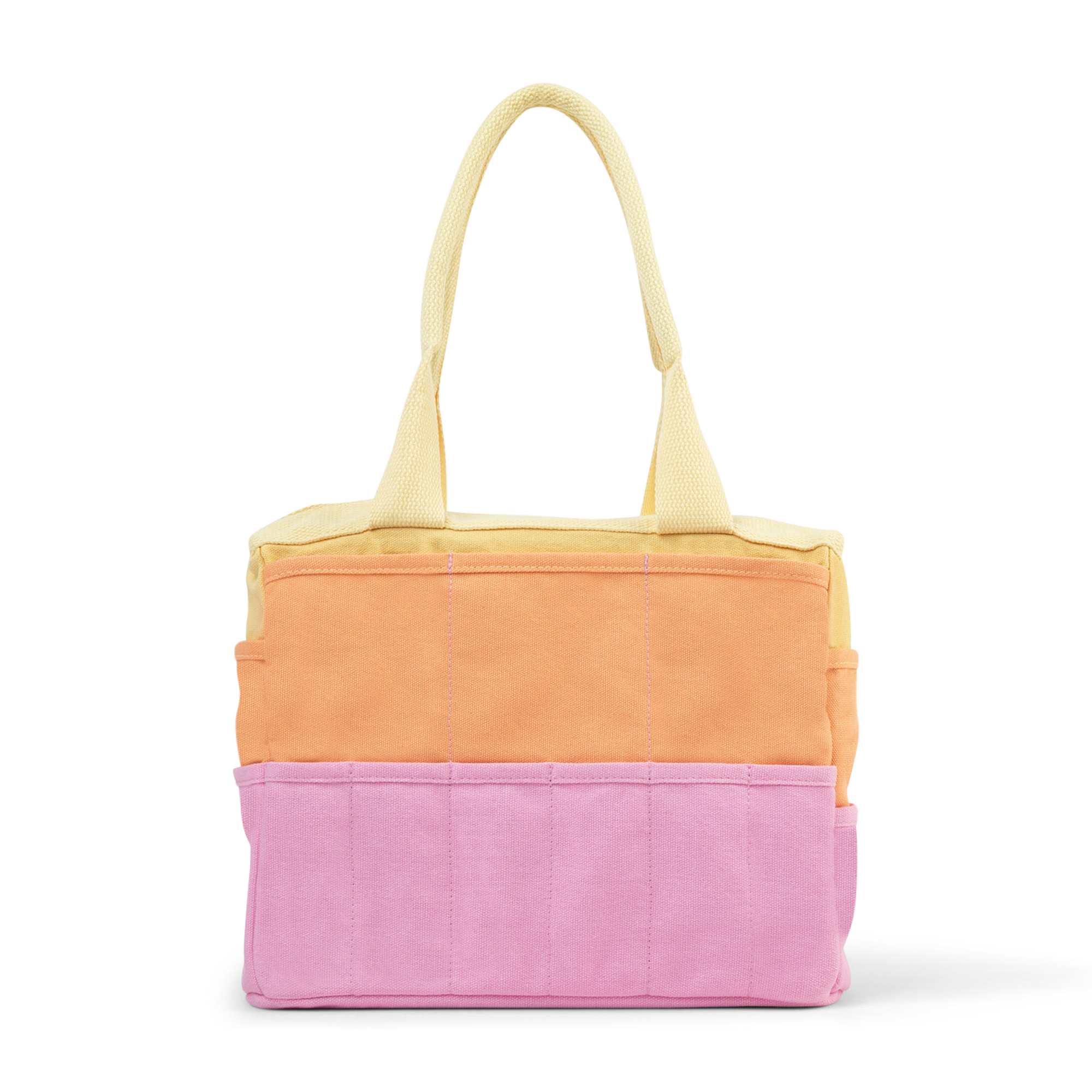 Color-blocked tote bag with yellow, orange, and pink sections on a white background