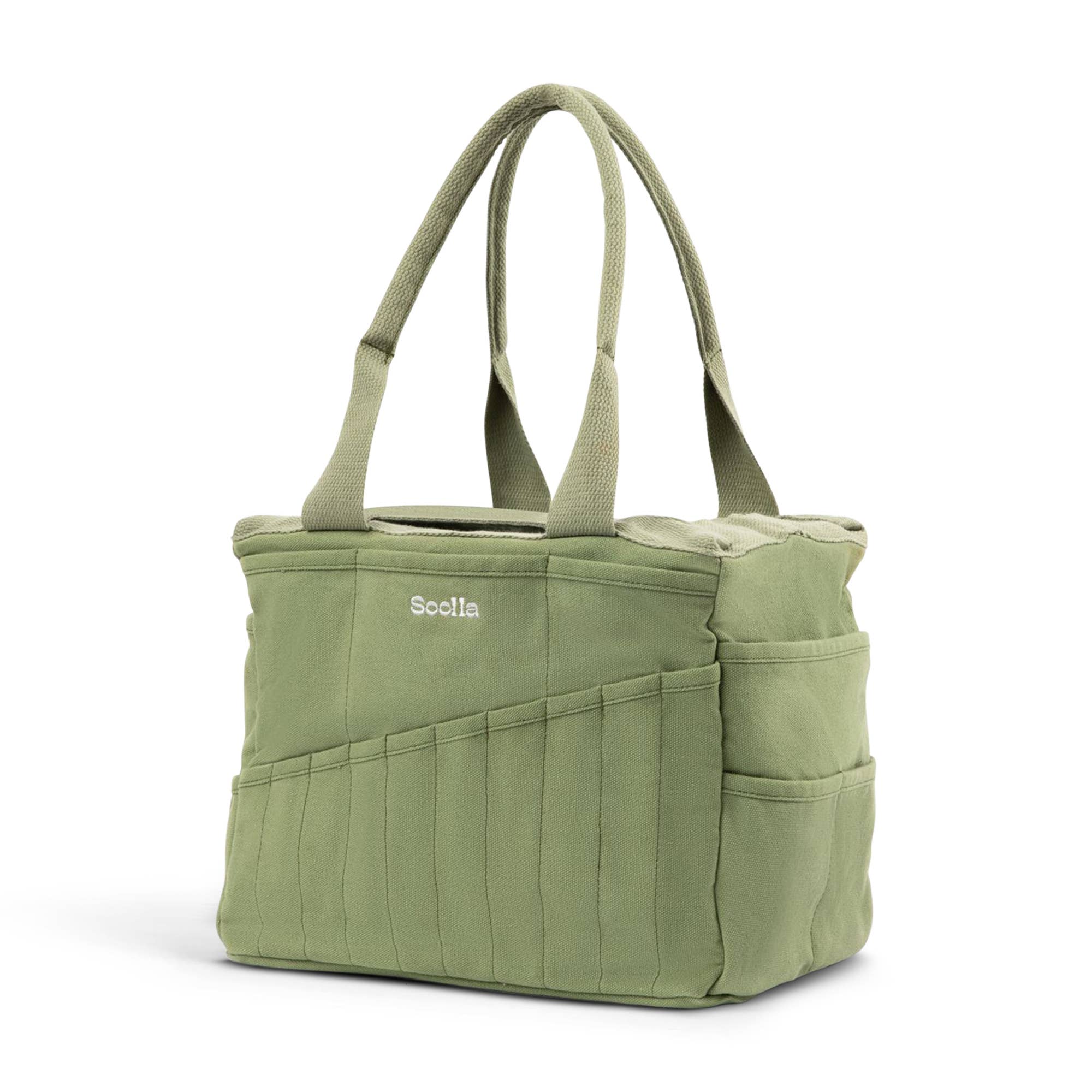 Green soolla tote bag with multiple pockets and a visible brand logo on a white background