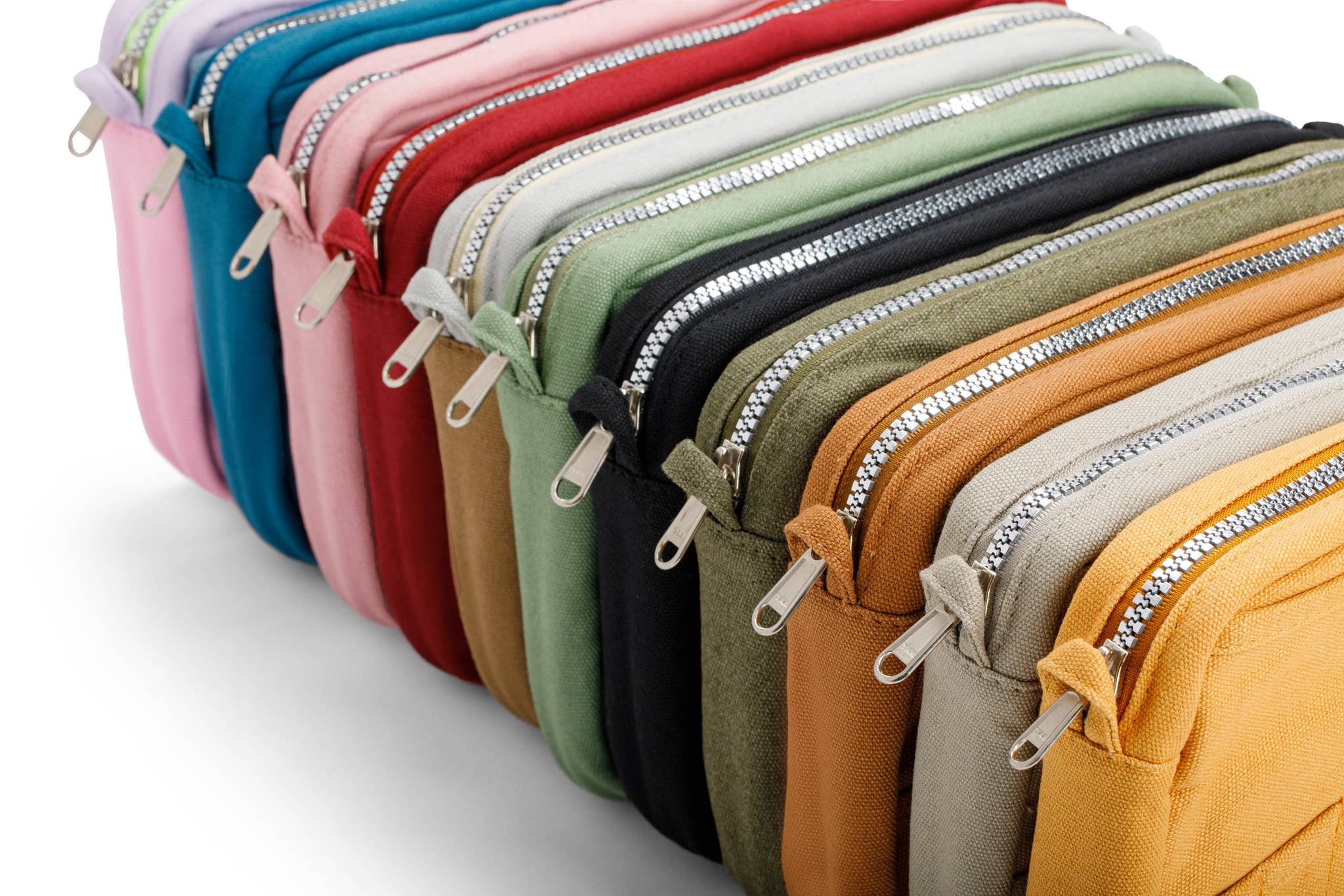 Row of colorful zippered pouches on a white background