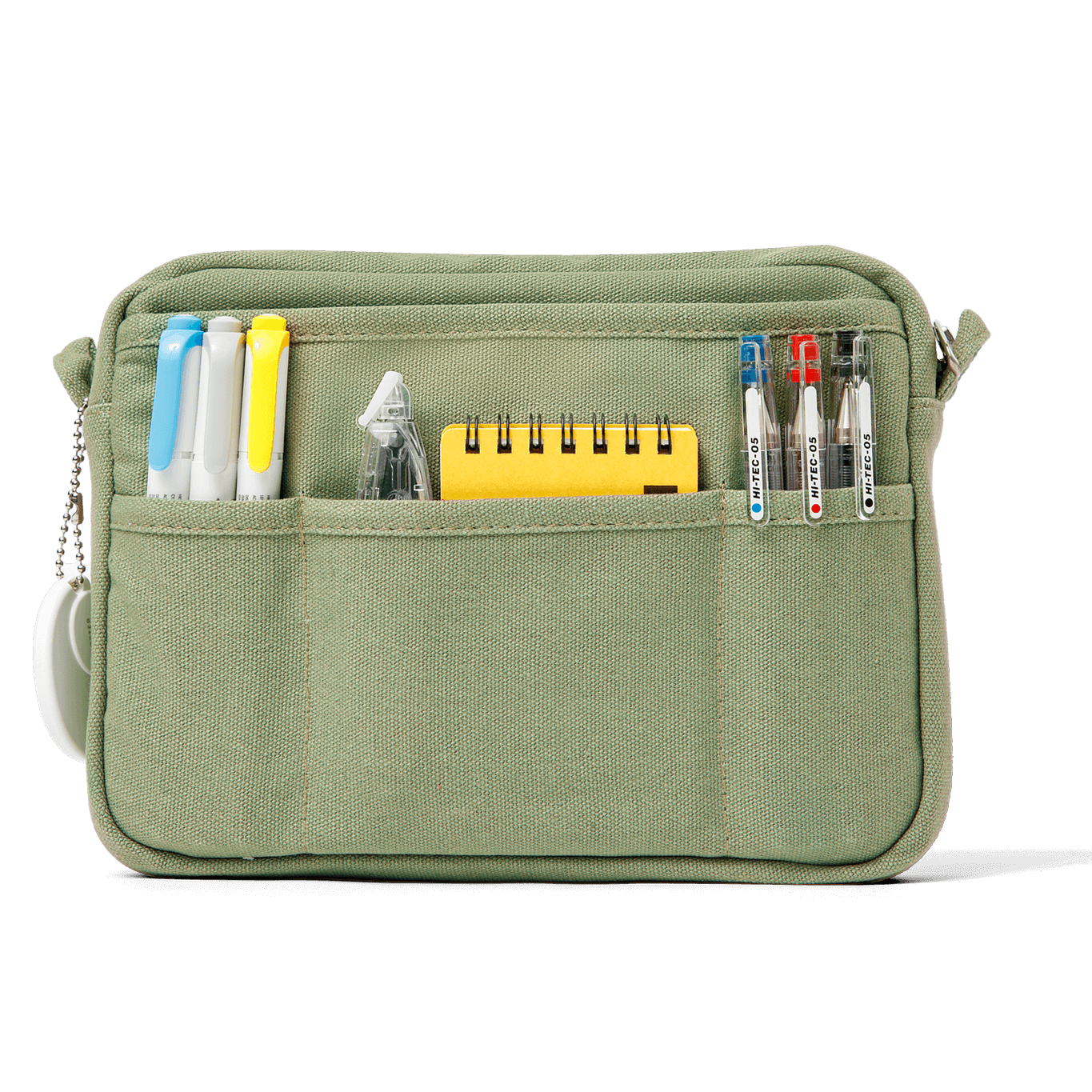 Green pouch with compartments holding stationery items on a white background