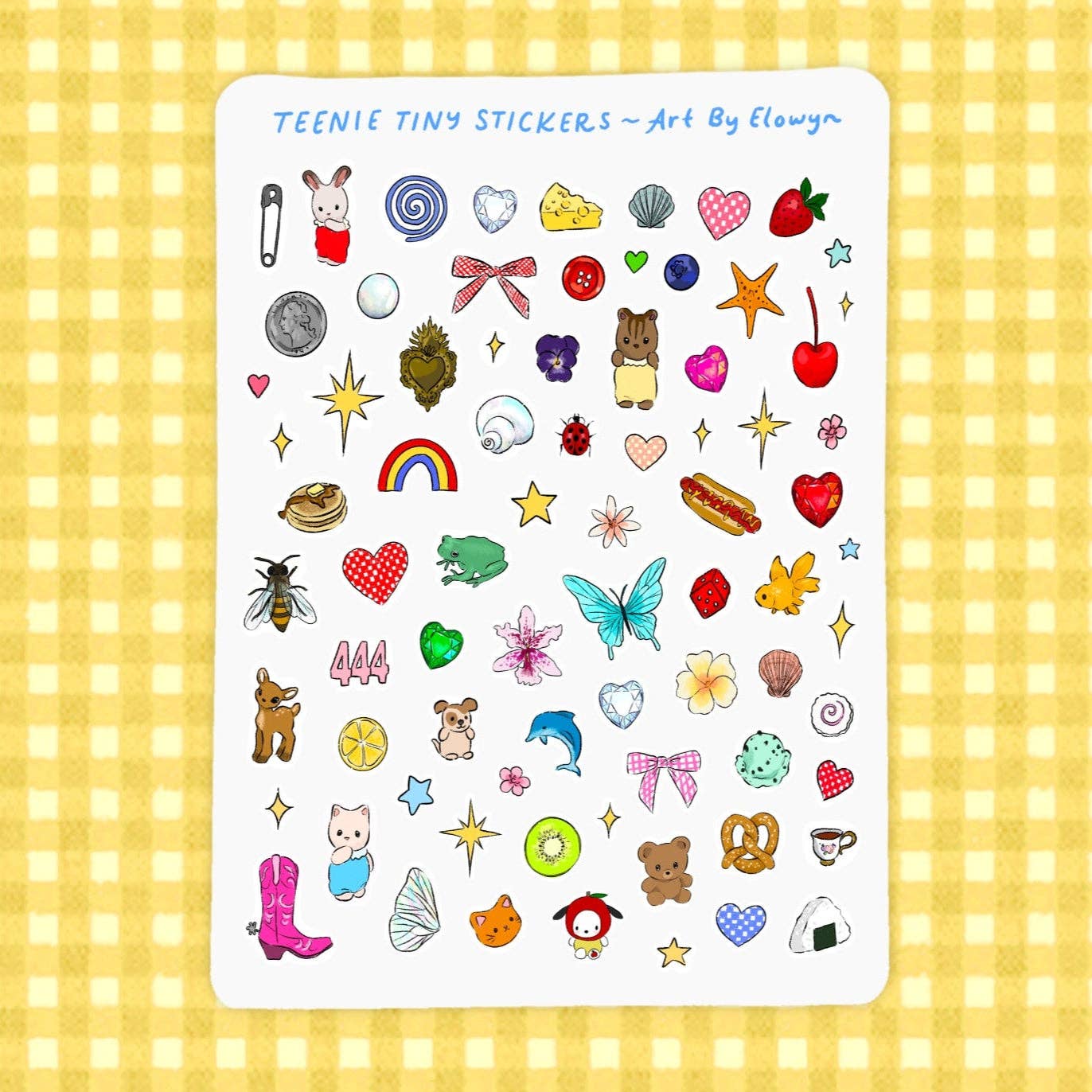 Sheet of colorful stickers on a yellow checkered background