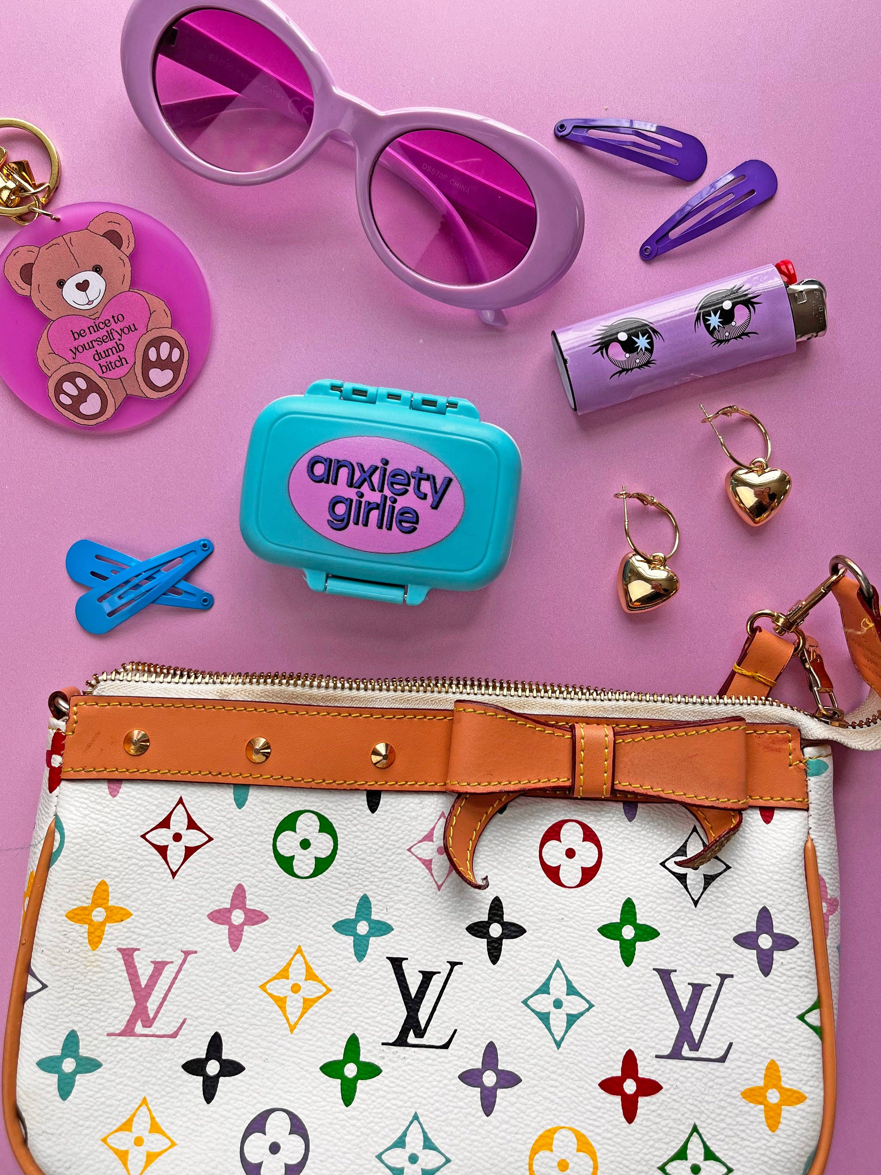 Collection of accessories including sunglasses, hair clips, and a handbag on a pink background