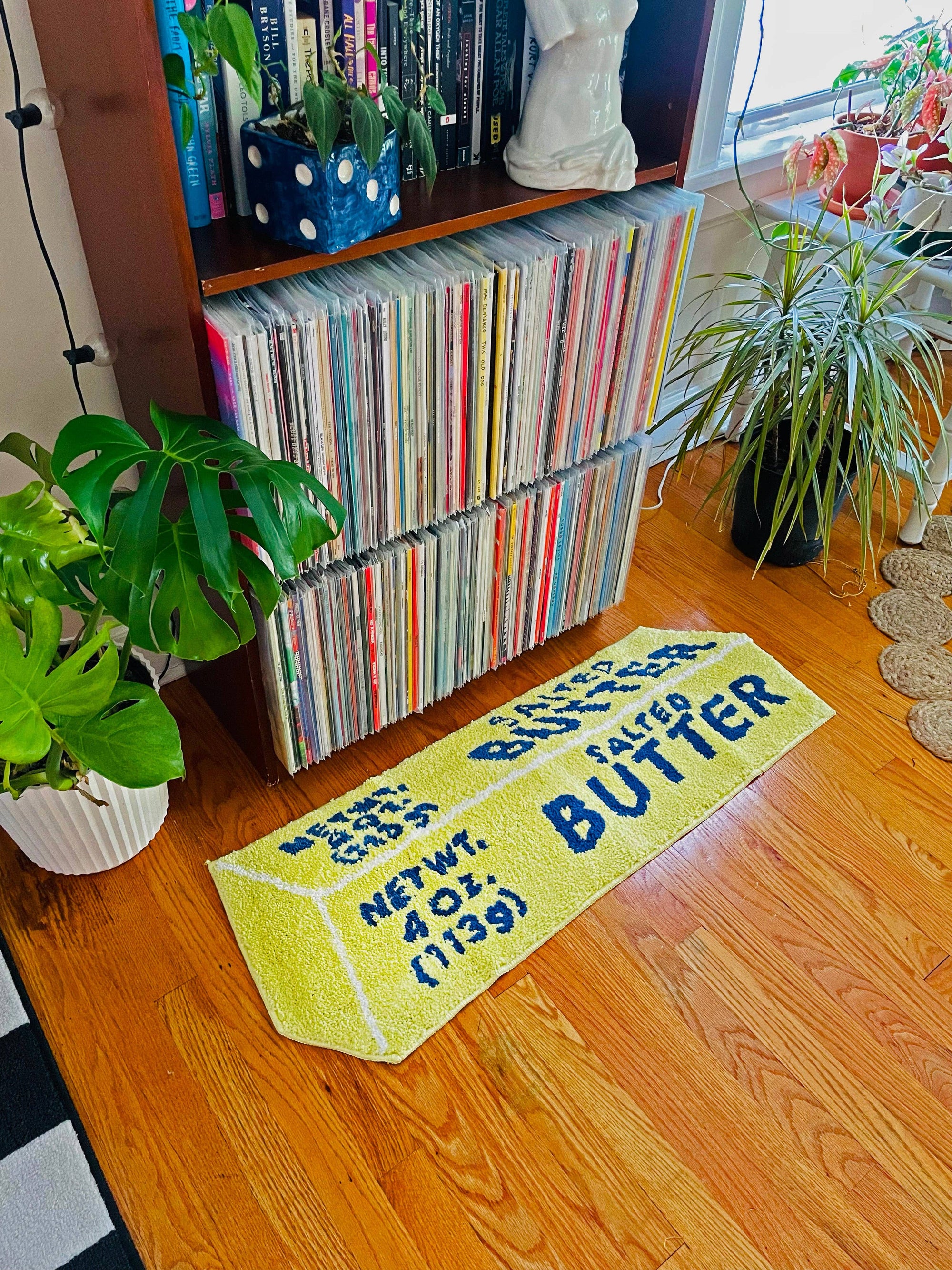 Butter Rug on wooden floor