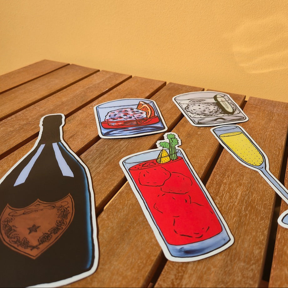Illustrated bottle, glass of red drink, and other items on a wooden surface with a yellow background