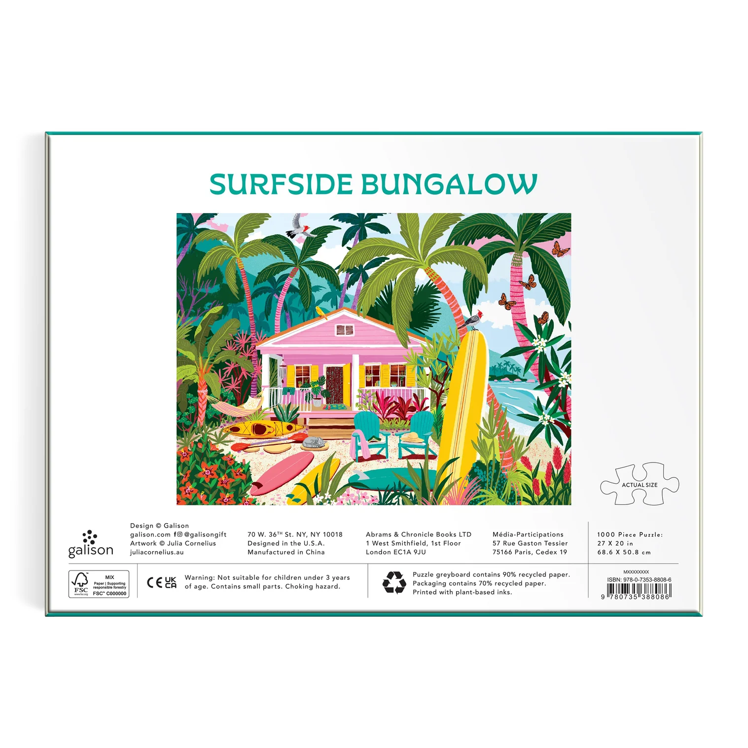 Jigsaw puzzle packaging with a tropical house and palm trees design.