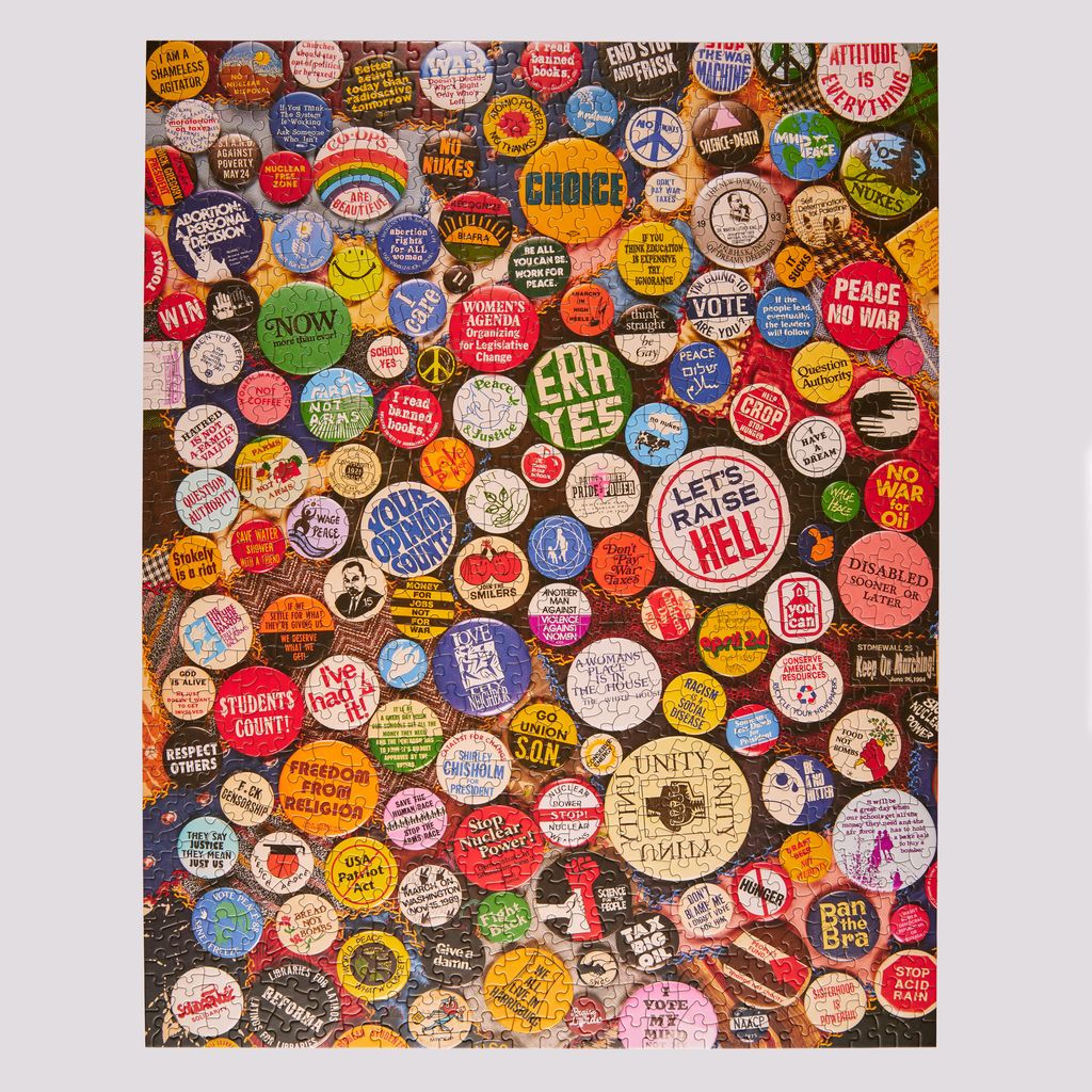 Collection of vintage buttons with various messages and designs on a collage background.