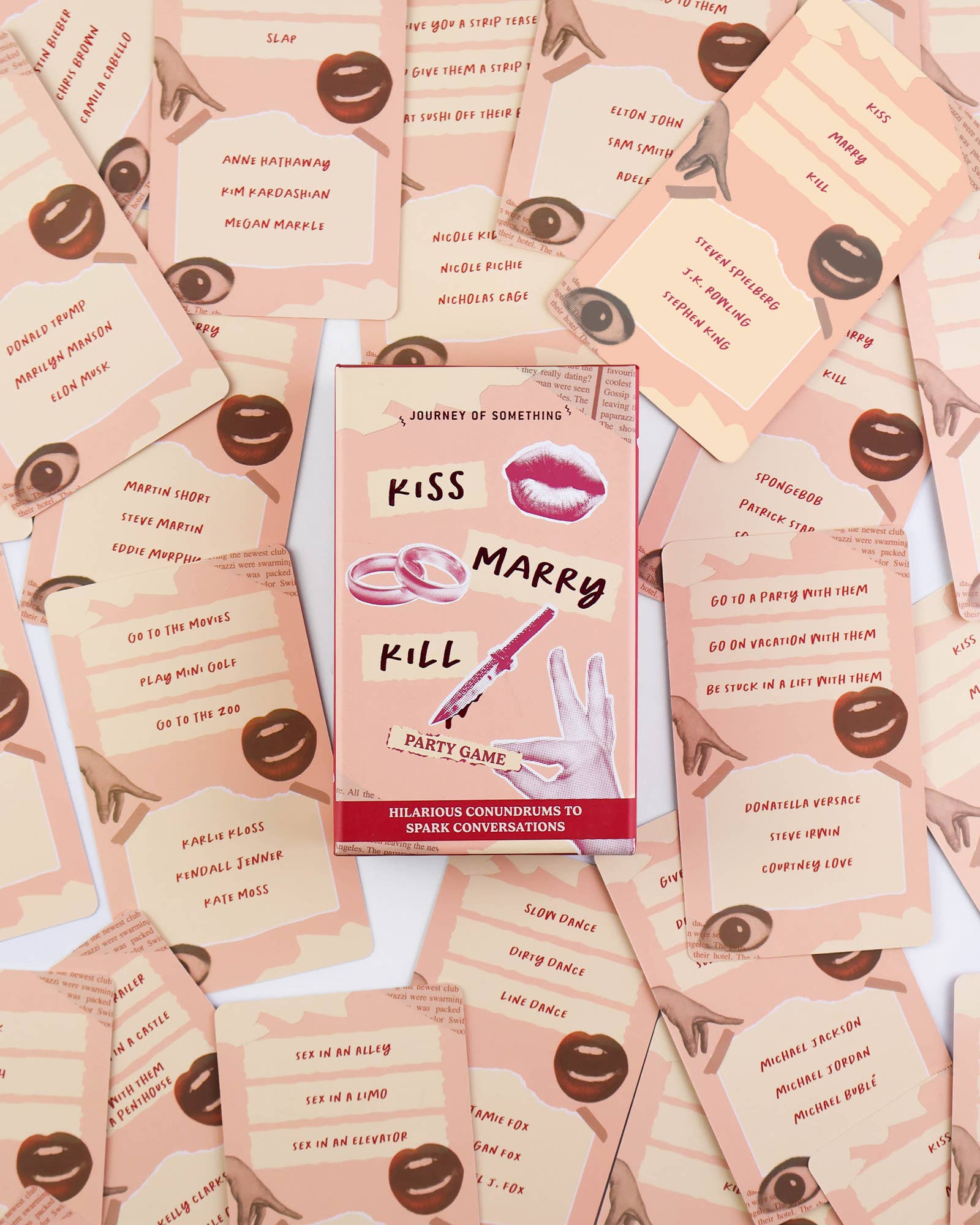 Party game box surrounded by pink cards with text and lip prints