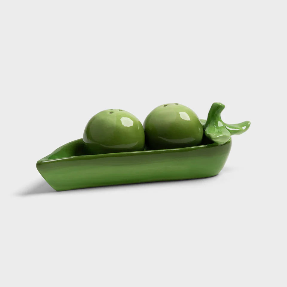 Green ceramic set of two peas in a pod on a white background