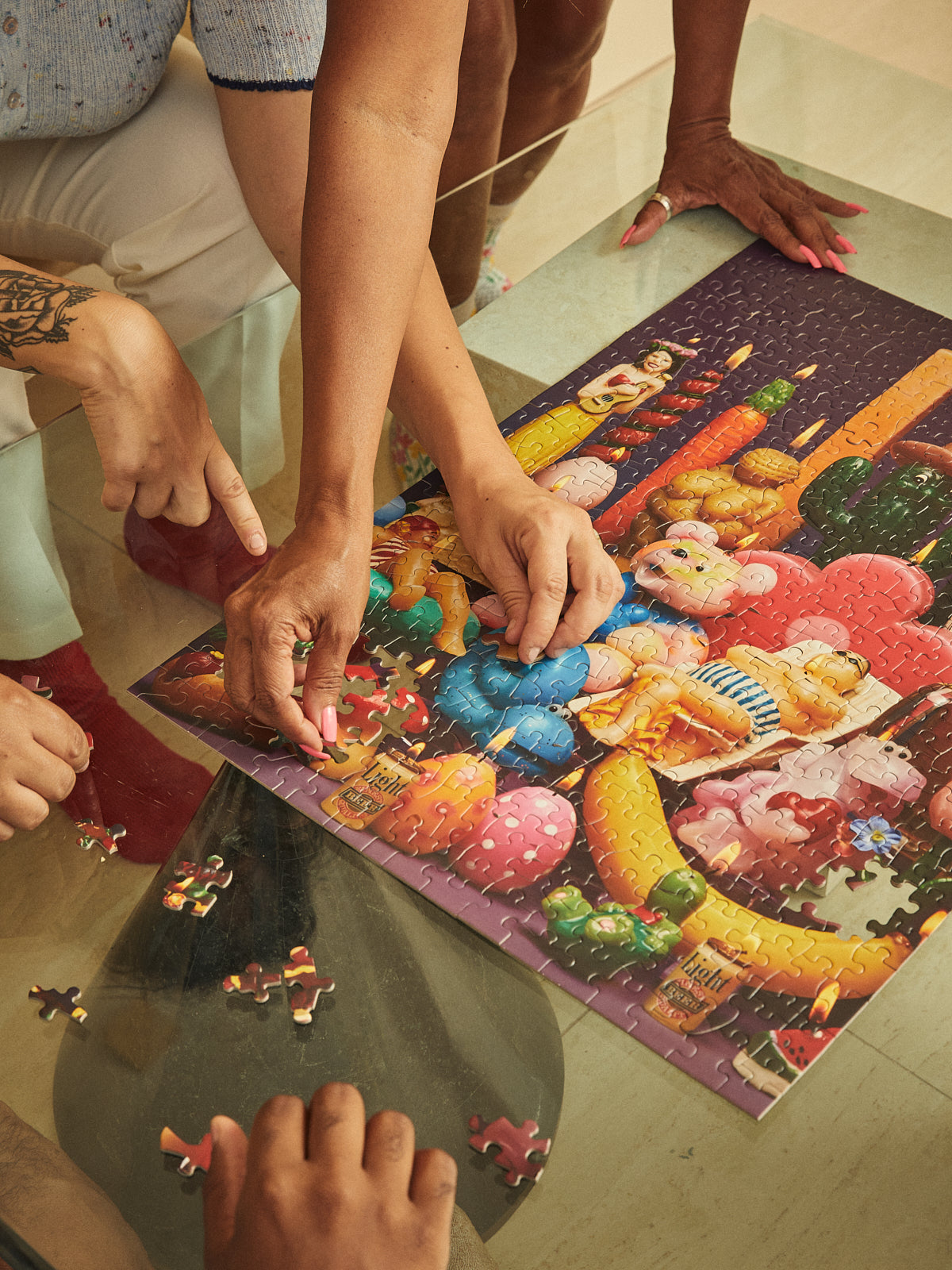 le puzz lighten up puzzle on a glass table