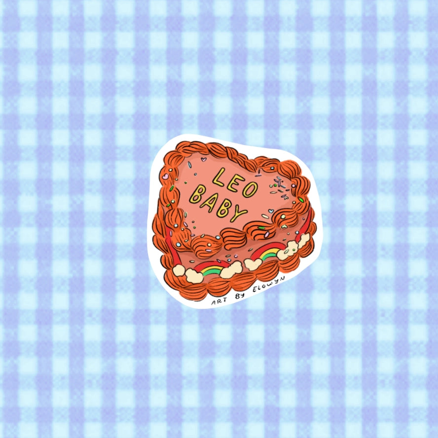 Illustrated sticker with 'LEO BABY' text on a blue checkered background