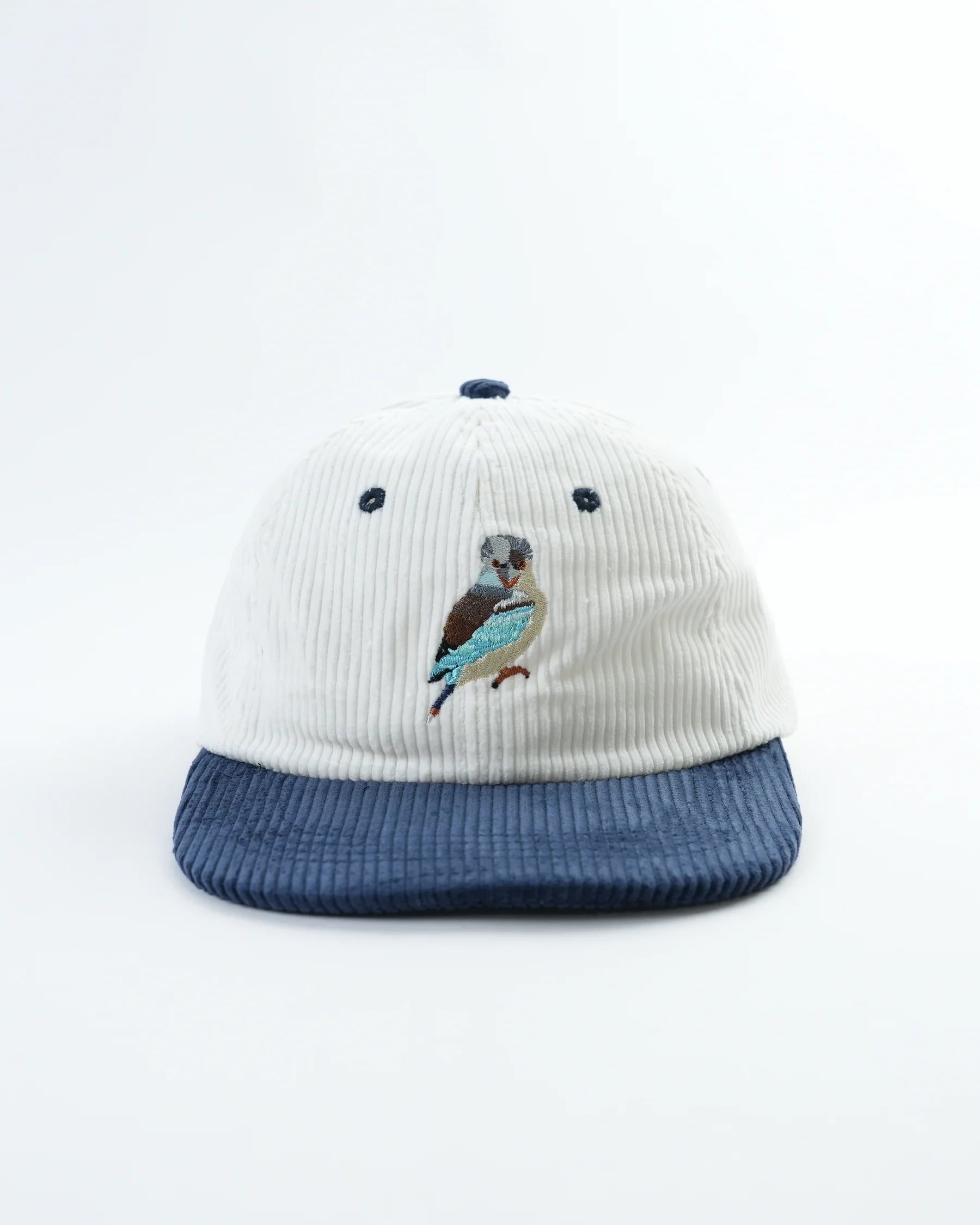 Cap with embroidered kookaburra design on a white background