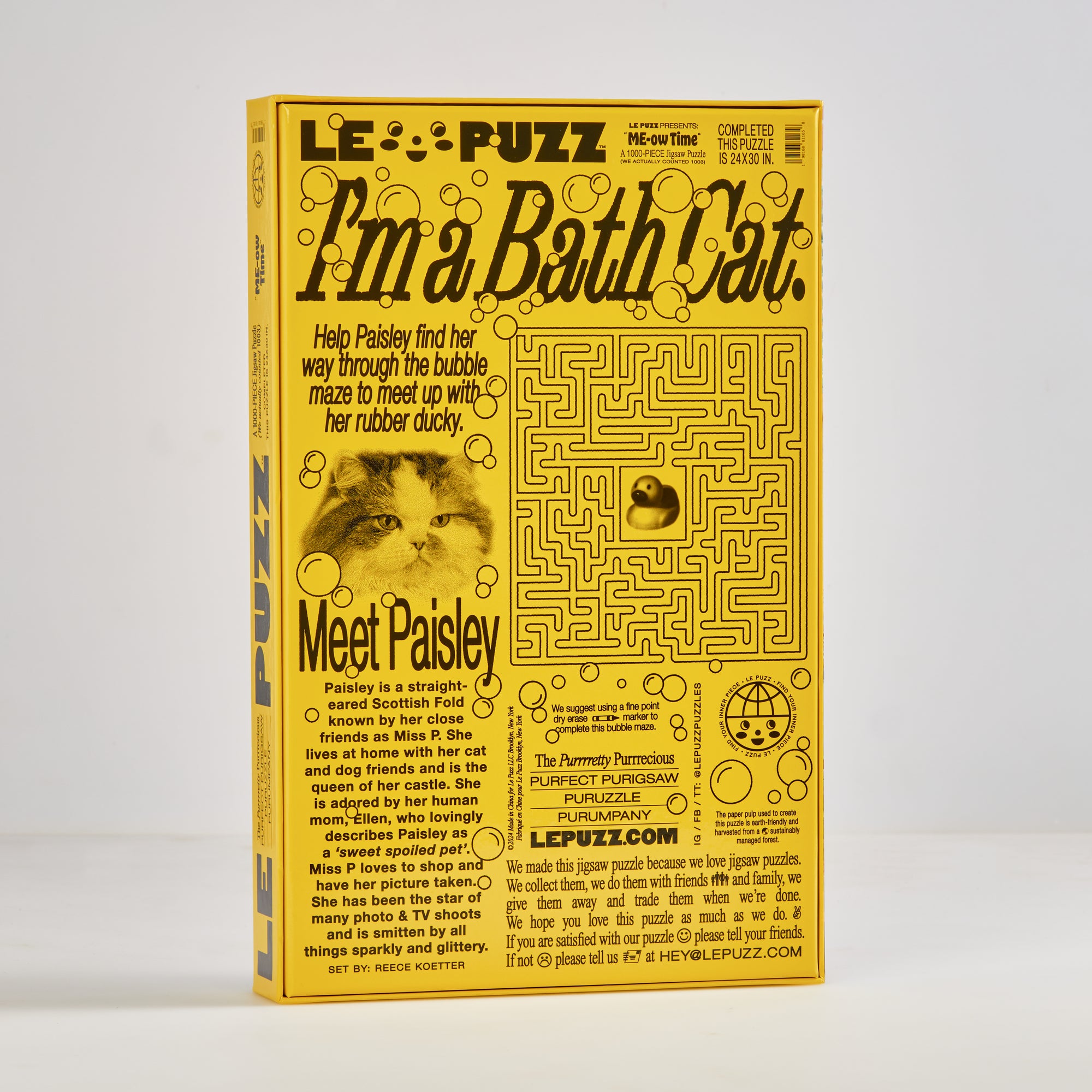 Le Puzz ME-ow Time puzzle box back with I'm a Bath Cat text, Paisley the cat, and a bubble maze activity