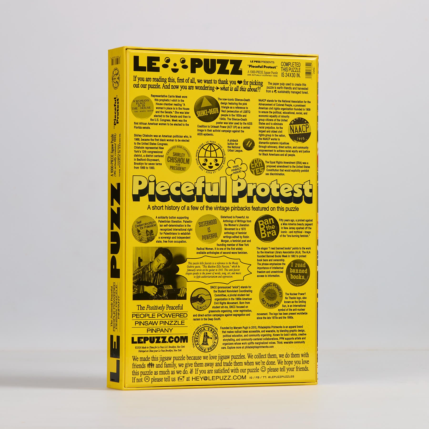 le puzz yellow box back with writing and a short history 