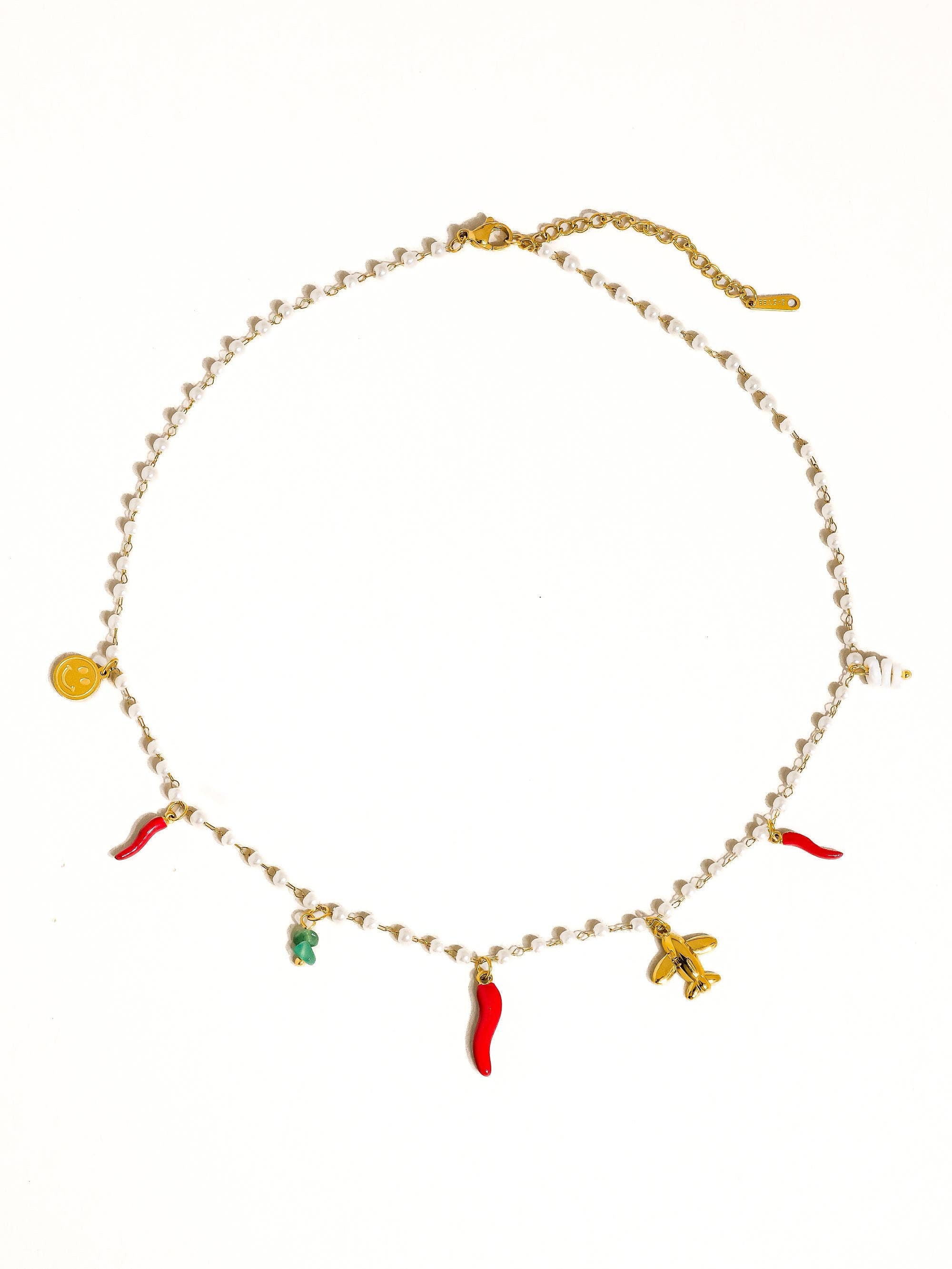 Necklace with colorful charms on a white background