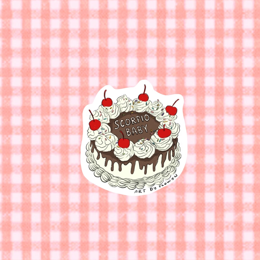Sticker of a cake with 'Scorpio Baby' text on a pink and white checkered background