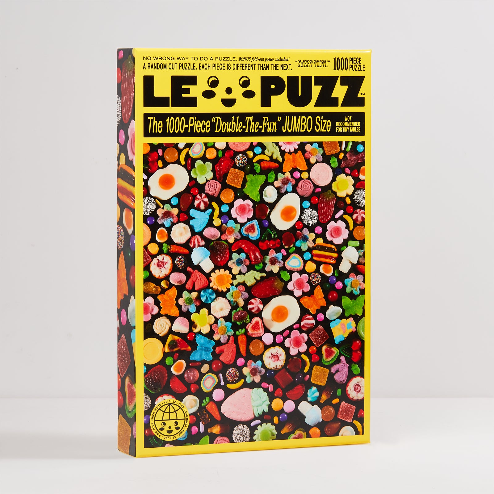 LE PUZZ puzzle box with colorful candy design on a white background
