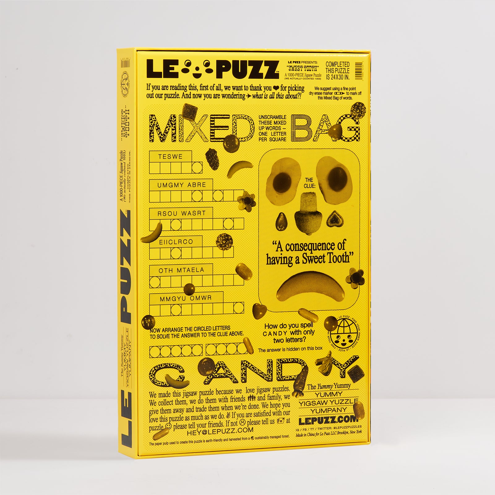 Yellow puzzle box with black text and graphics on a white background
