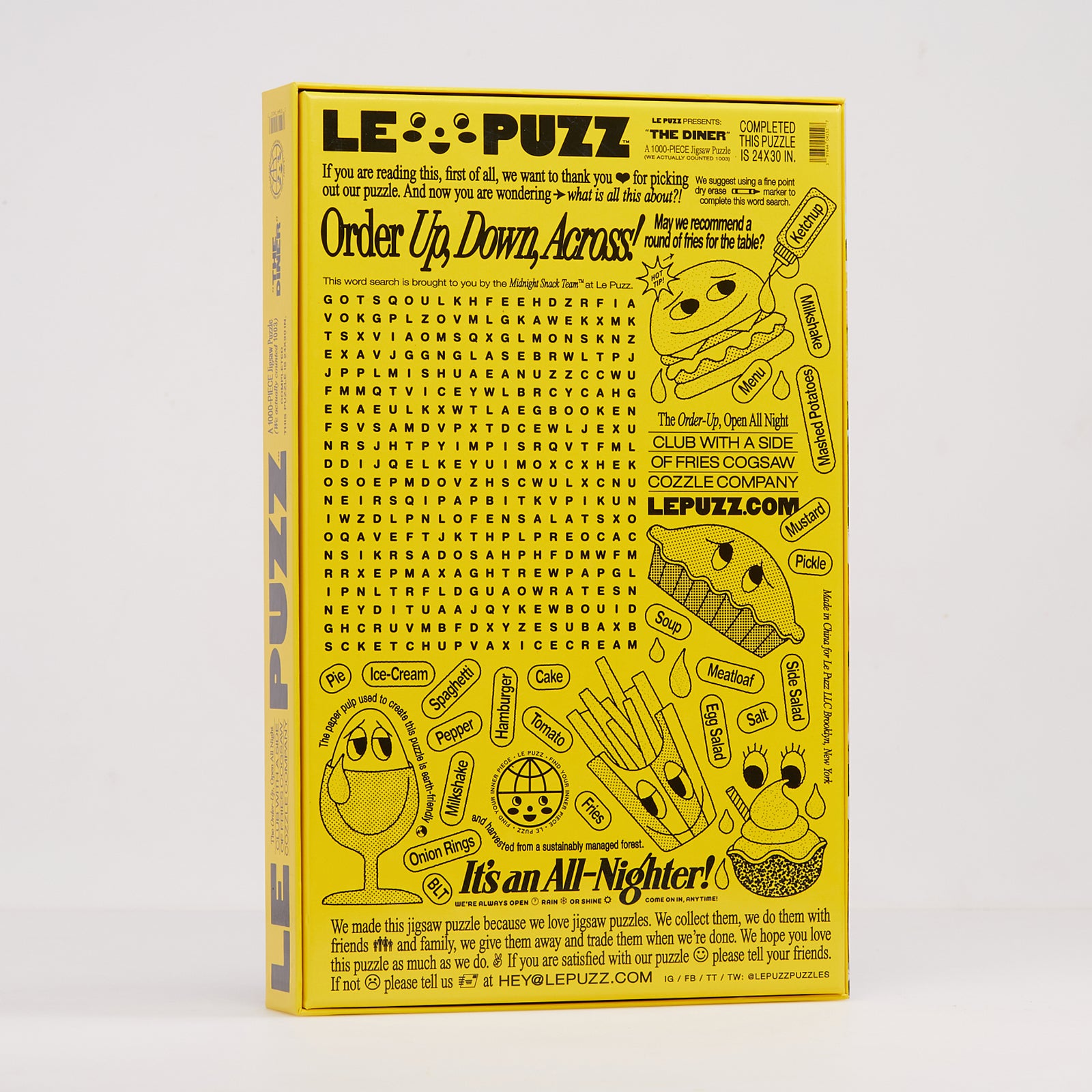 A yellow 'Le Puzze' word search puzzle box shown on a plain white background. The box features a dense grid of words, cartoon illustrations, and text including 'Order Up, Down, Across' and 'It's an All-Nighter!'.