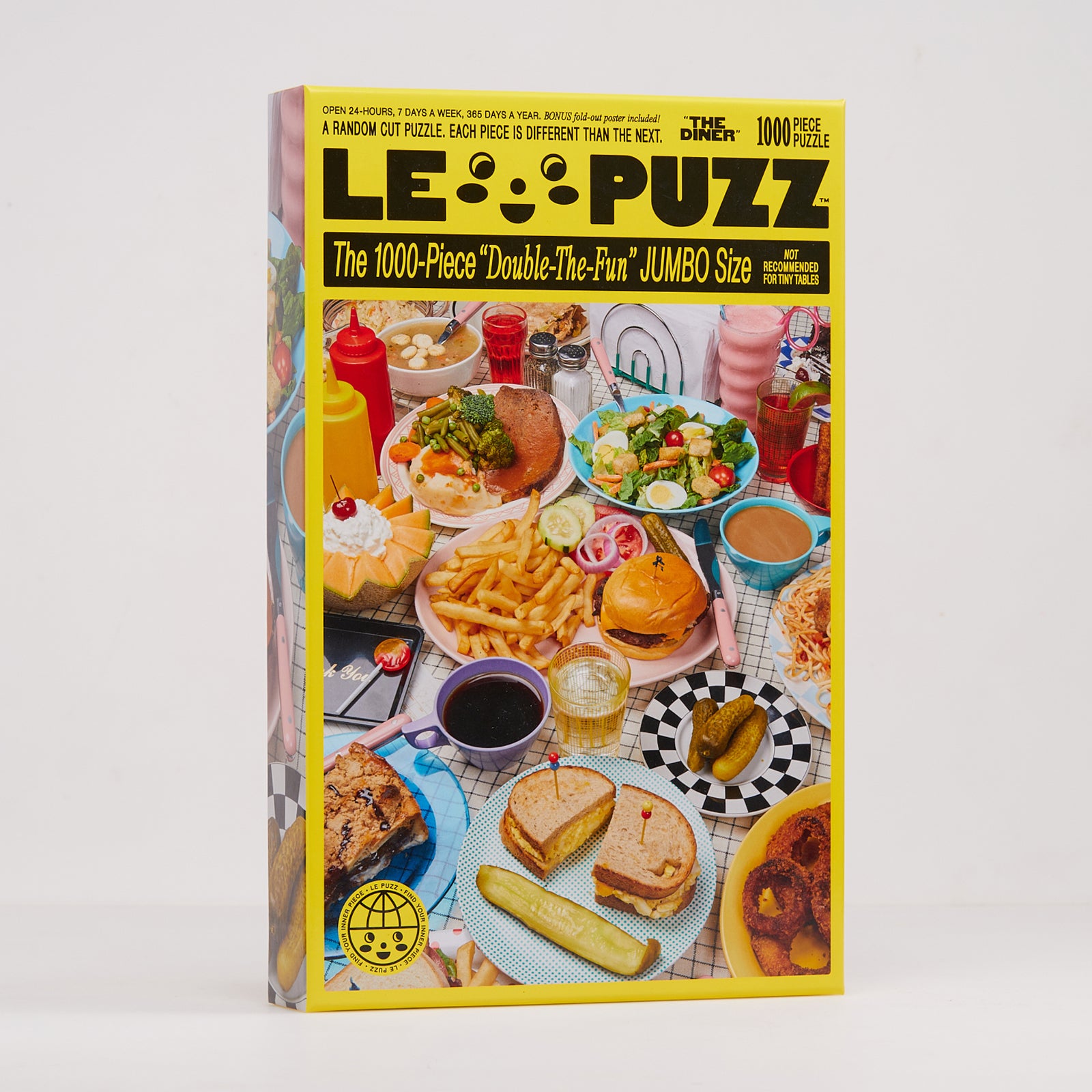 A 1000-piece jigsaw puzzle box titled 'The Diner' by LePuzz, featuring a colorful cover illustration of a diner table filled with burgers, fries, hot dogs, and salads, set against a plain light gray background.