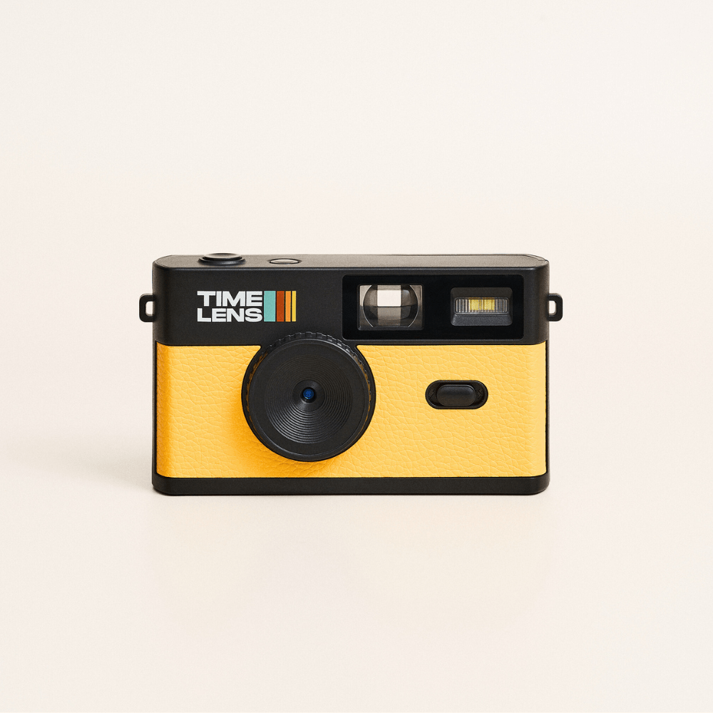 Yellow camera with 'Time Lens' branding on a beige background
