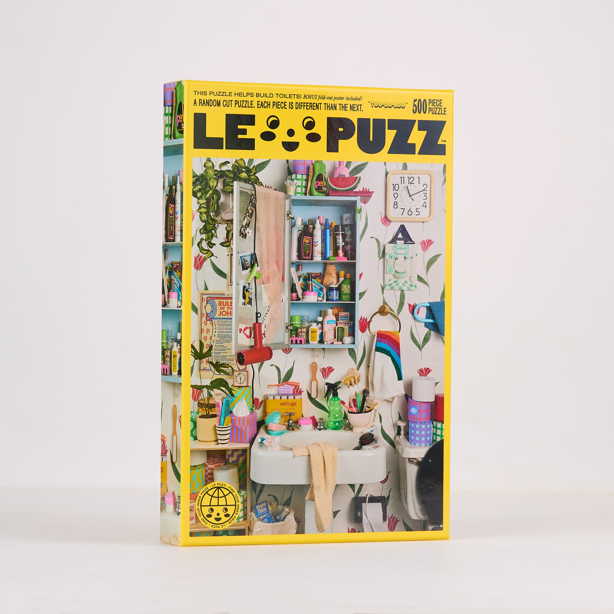 Le Puzz Too-Da-Loo 500 piece puzzle box front showing a colourful retro bathroom scene on a white background