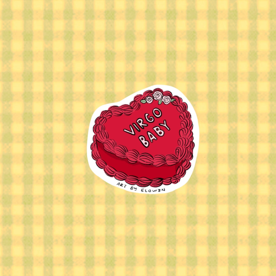 Red decorative item with 'Virgo Baby' text on a yellow and green striped background